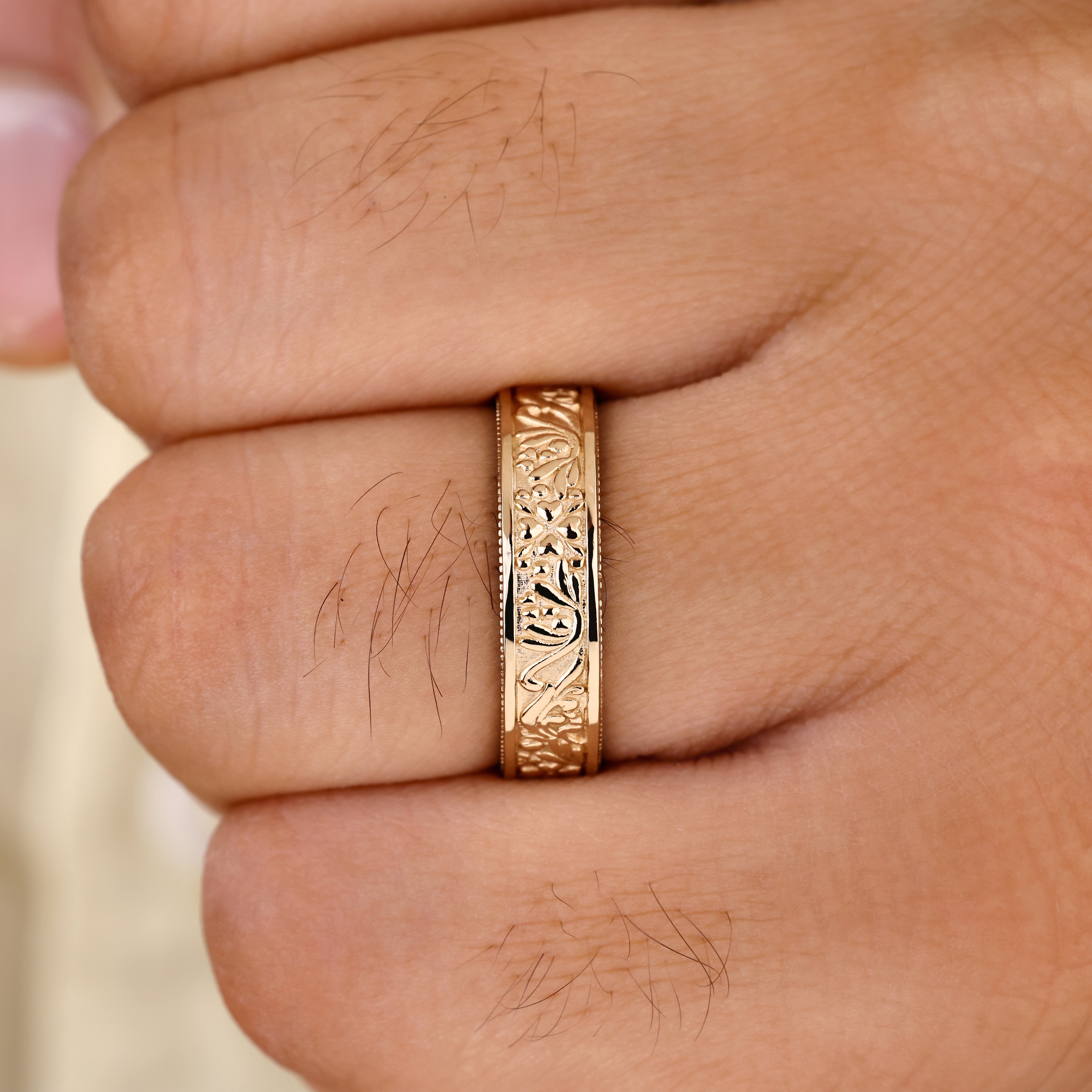 Comfort fit wedding band with detailed milgrain edge pattern
