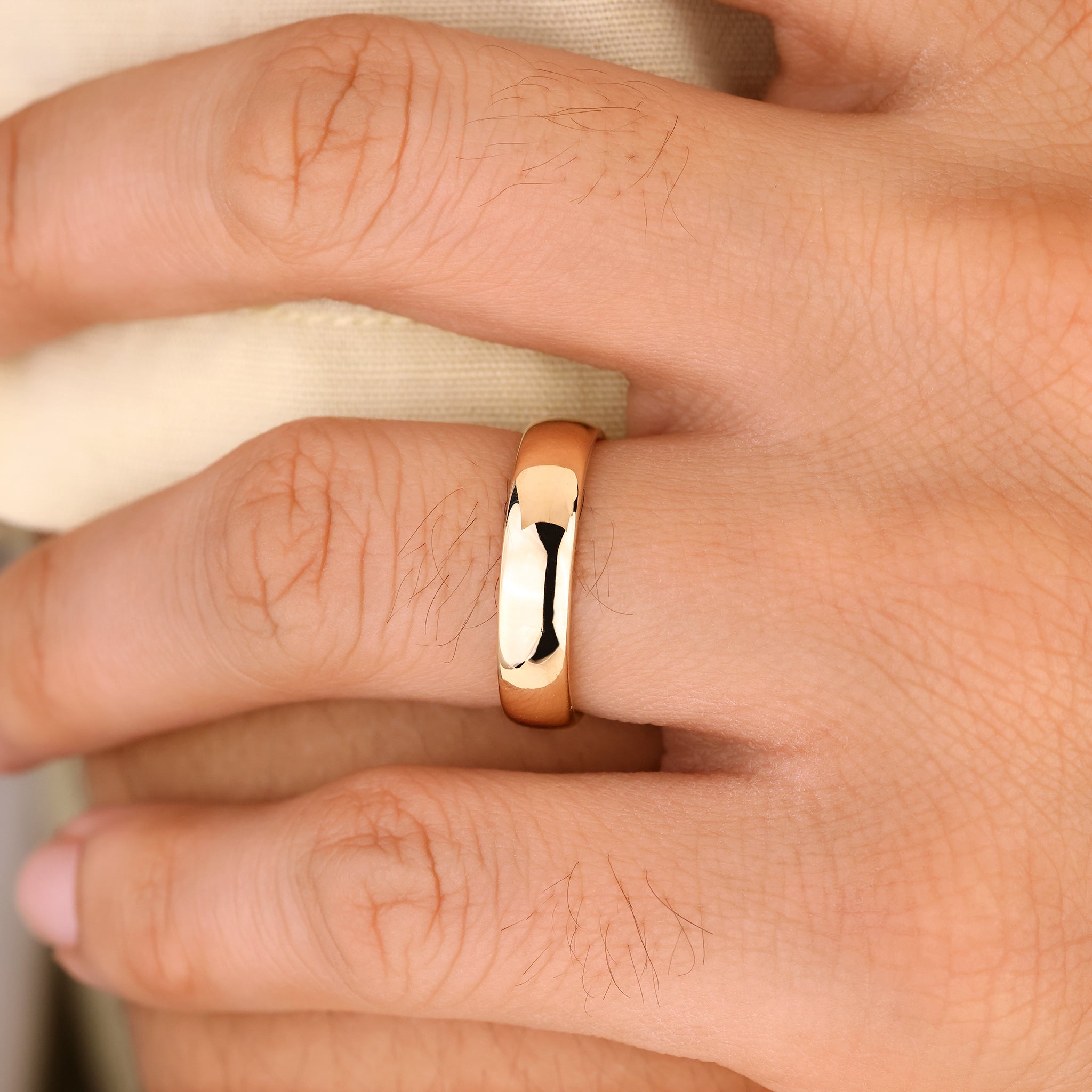 Mens plain wedding band with sleek and minimal design.
