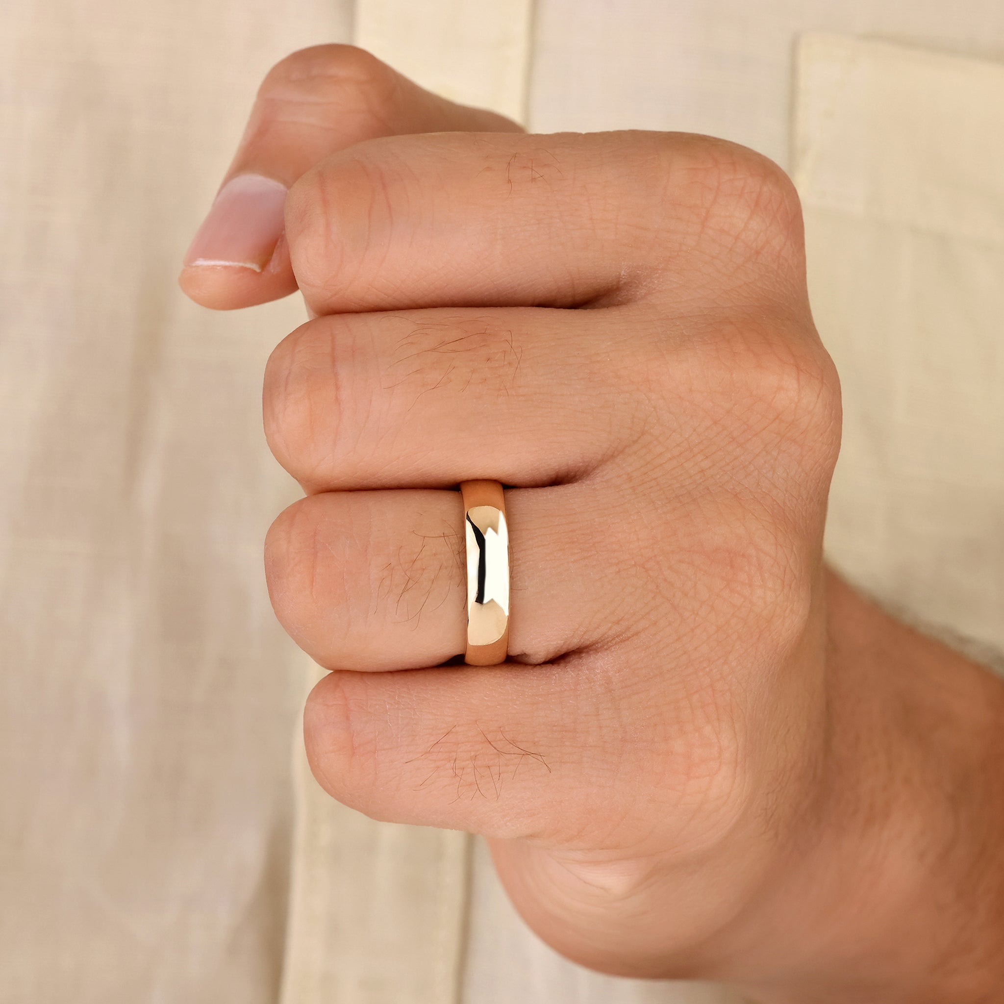 Classic plain mens wedding band with handmade finish design.
