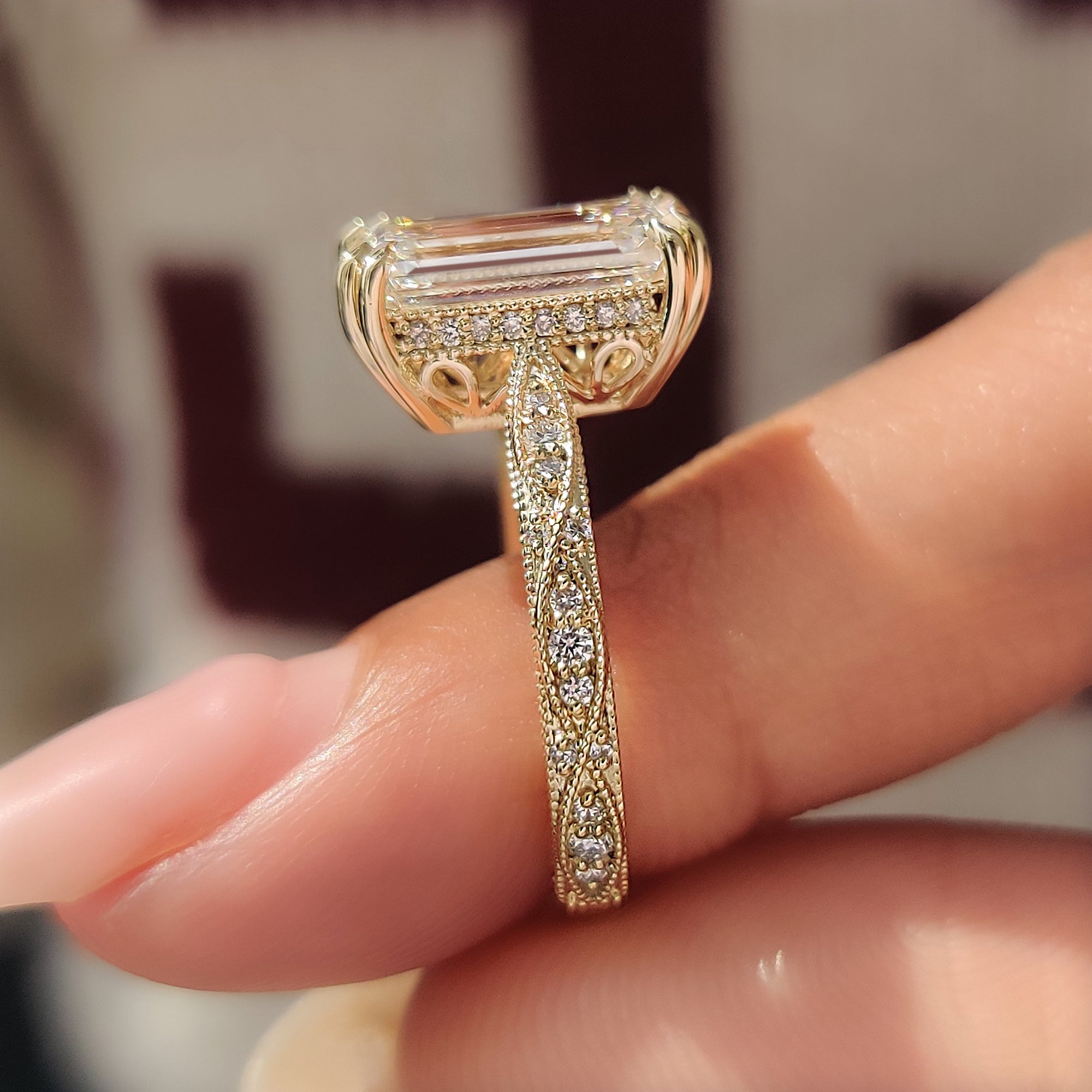 Emerald cut diamond ring with basket setting.
