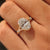 IGI certified 2.00 carat oval diamond ring with round side stones.
