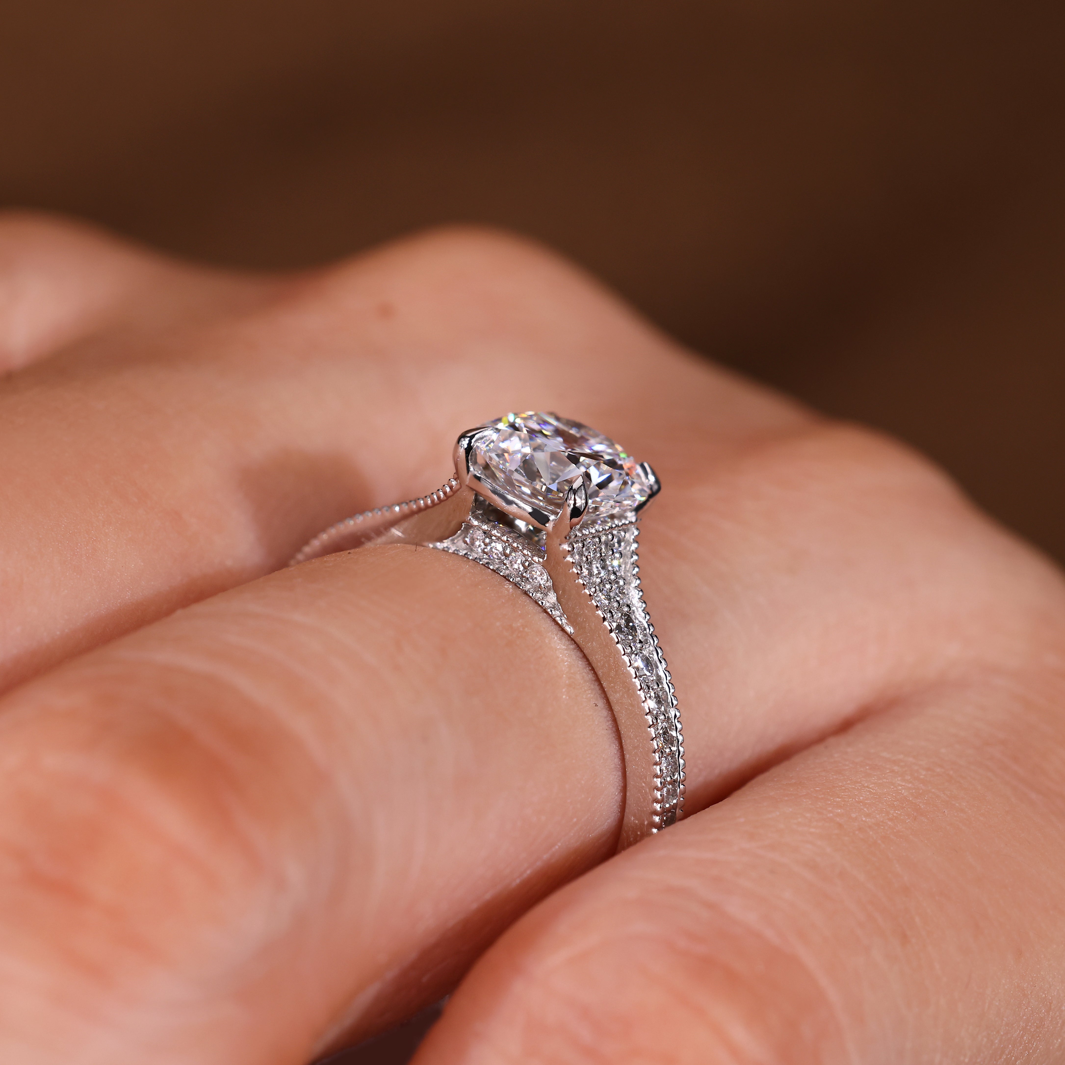 Round diamond engagement ring handcrafted by Carat Diamonds
