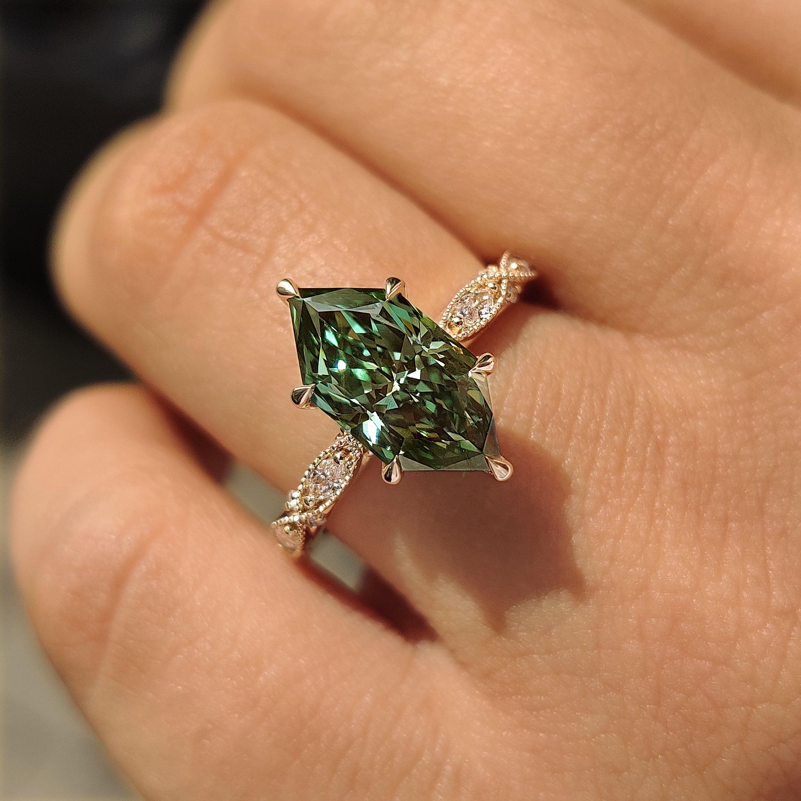 Green Dutch marquise ring with six claw prong setting
