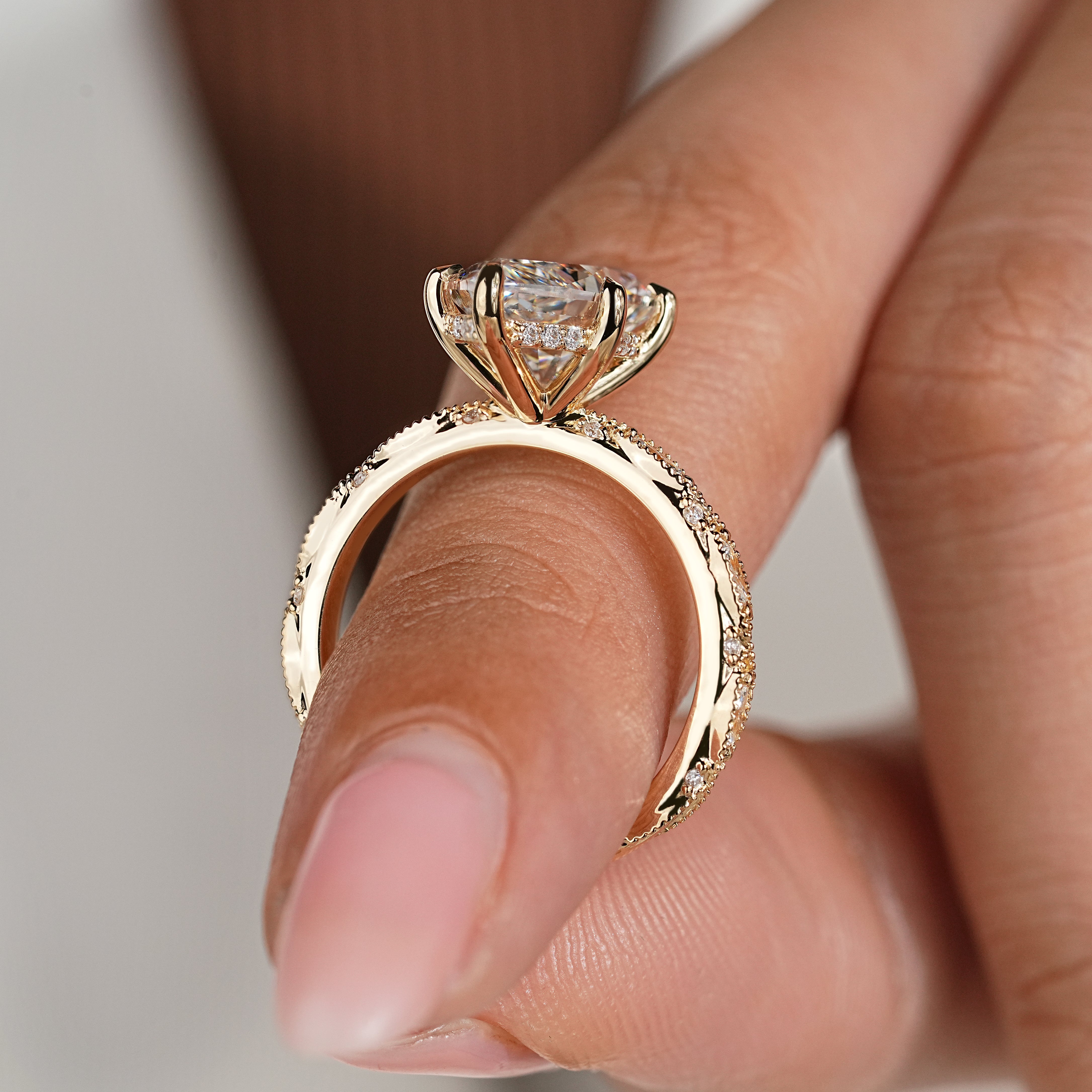 Marquise and round pave around dutch marquise center diamond
