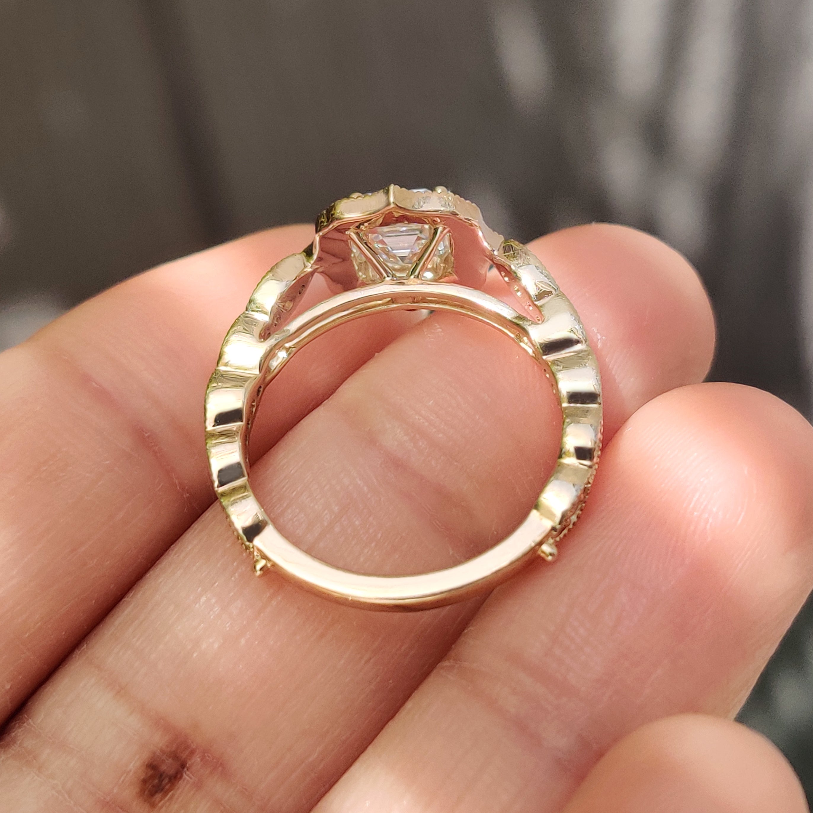 IGI certified Asscher diamond ring with milgrain vintage style.
