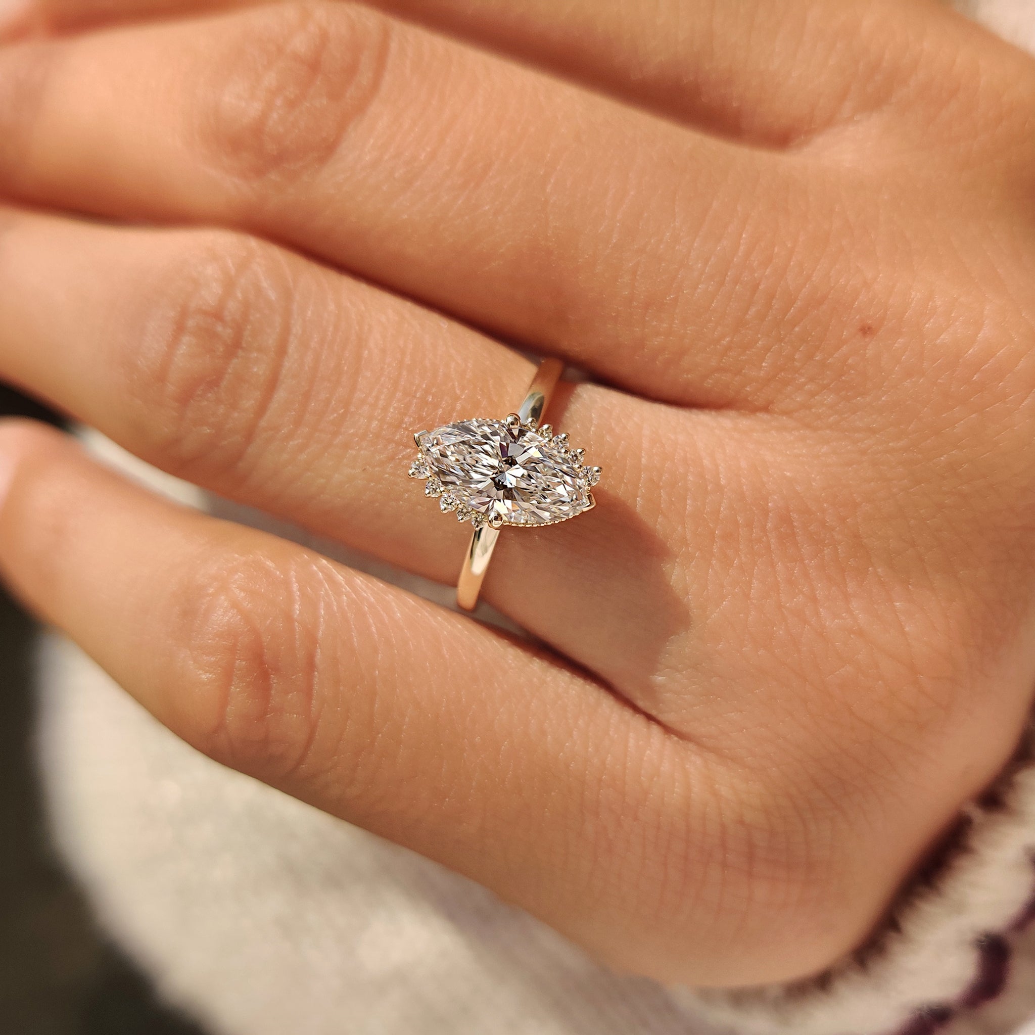 Handmade marquise cut ring with compass prong setting.
