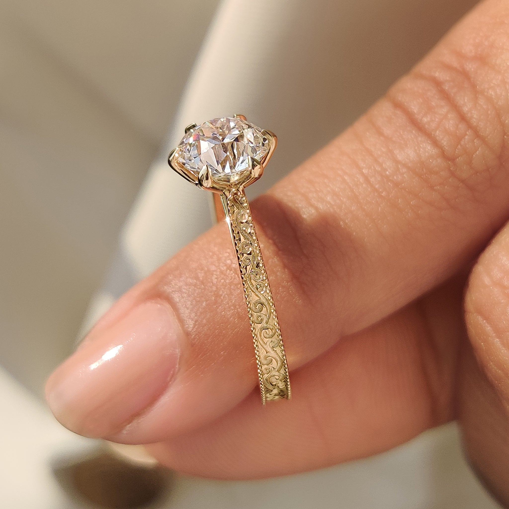 Art deco round diamond ring with tulip basket setting
