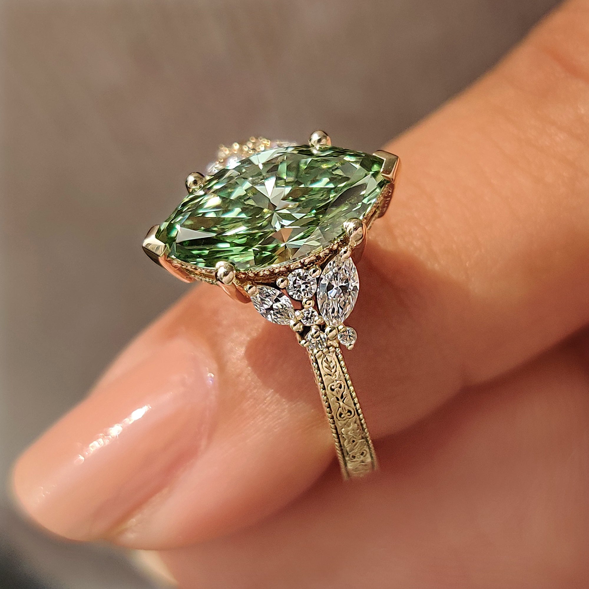 IGI certified green marquise diamond engagement ring.
