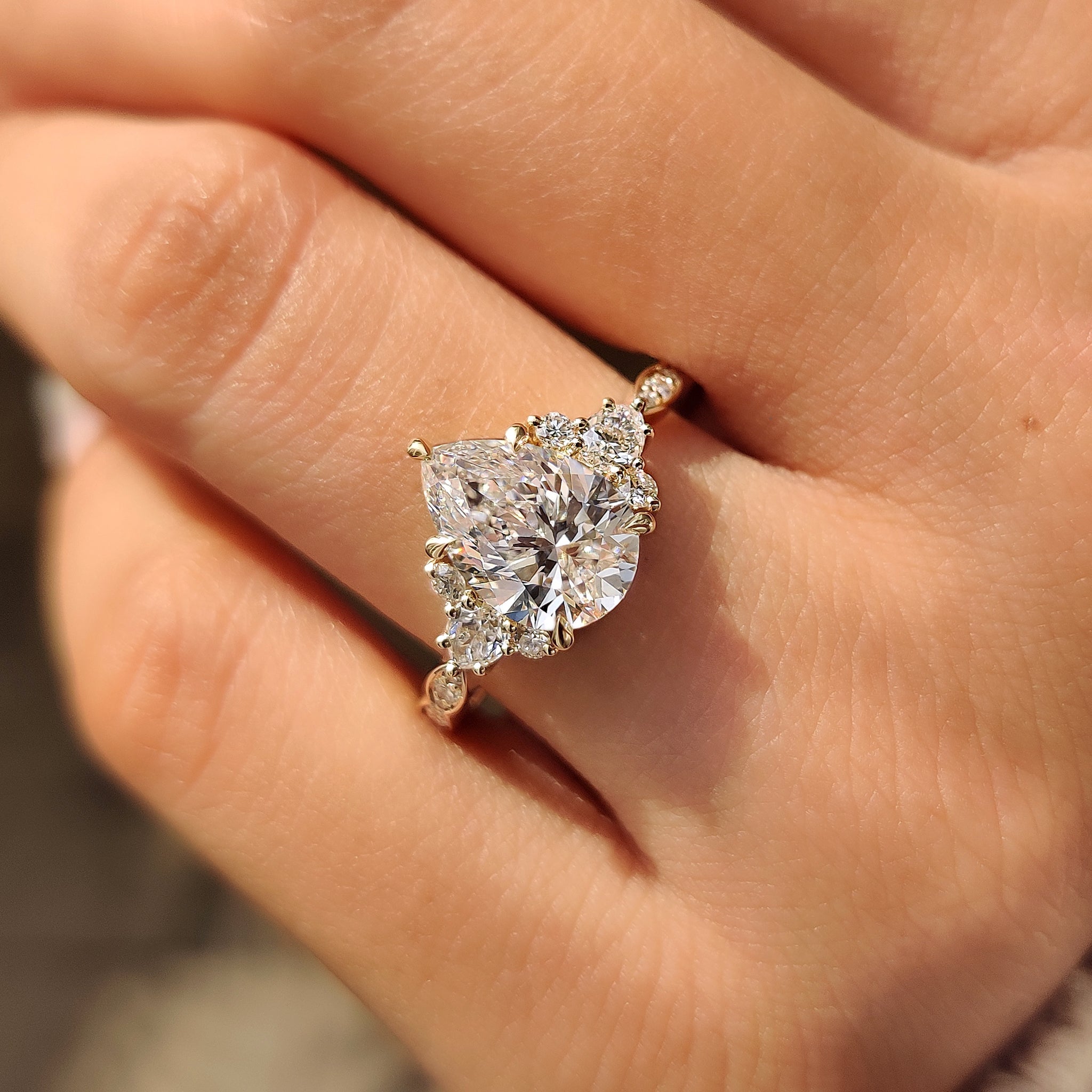 Lab grown diamond pear ring with vintage style.
