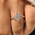 Handmade Dutch marquise ring with round side stone accents
