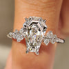 Coffin cut lab grown diamond ring with round side stones
