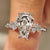 Coffin cut lab grown diamond ring with round side stones

