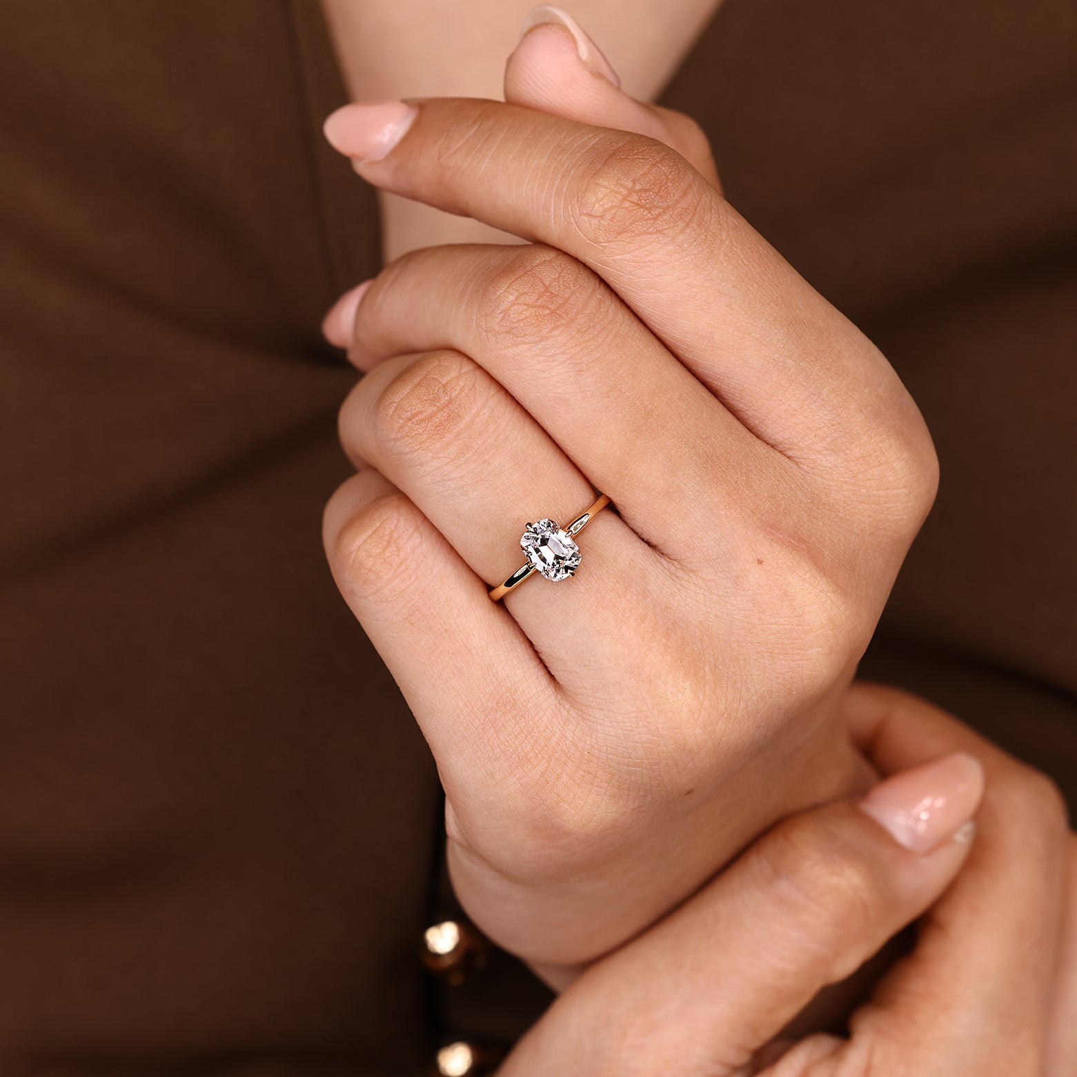 Handmade cushion cut diamond ring with hidden halo accents
