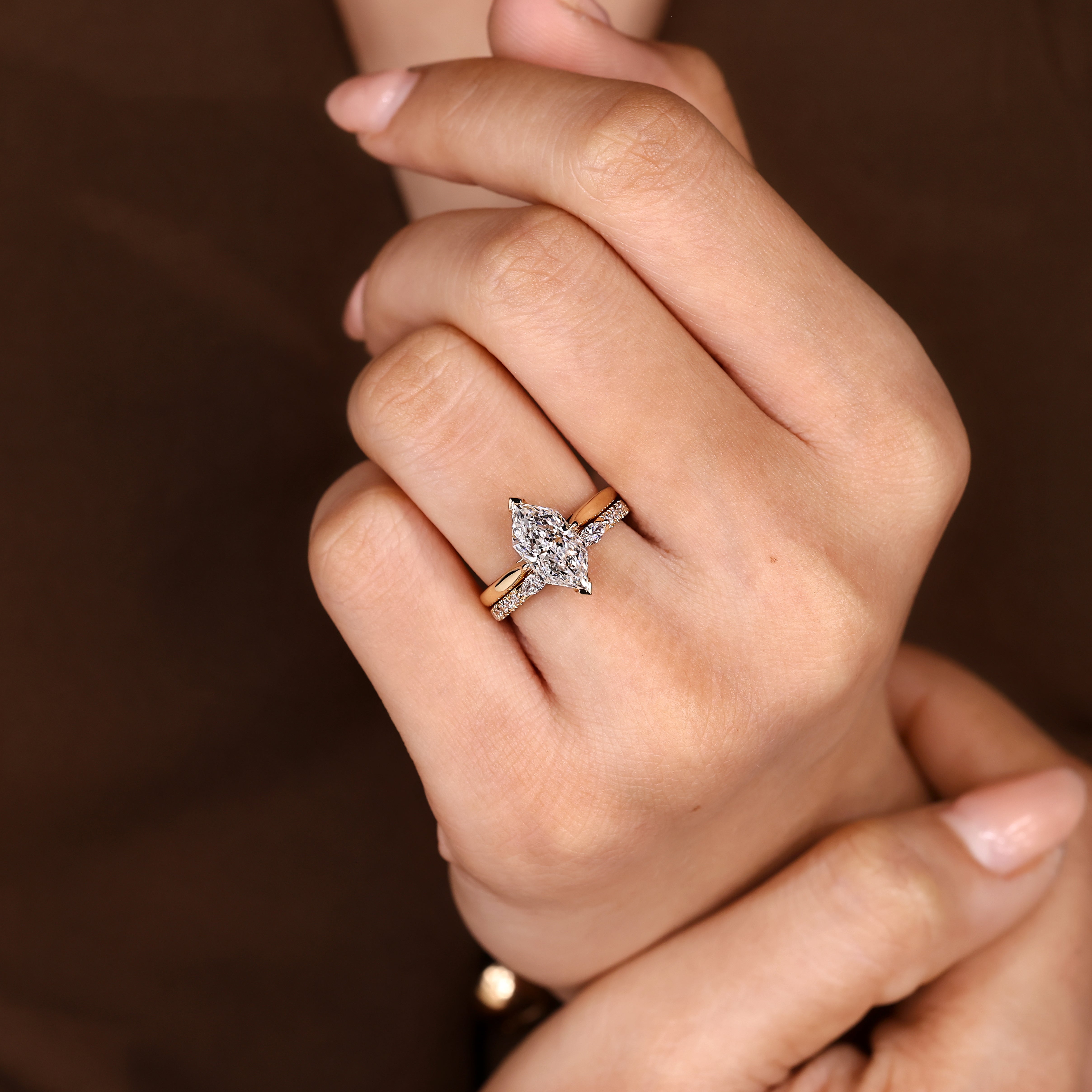 Dutch Marquise Ring with Marquise and Round Side Stones
