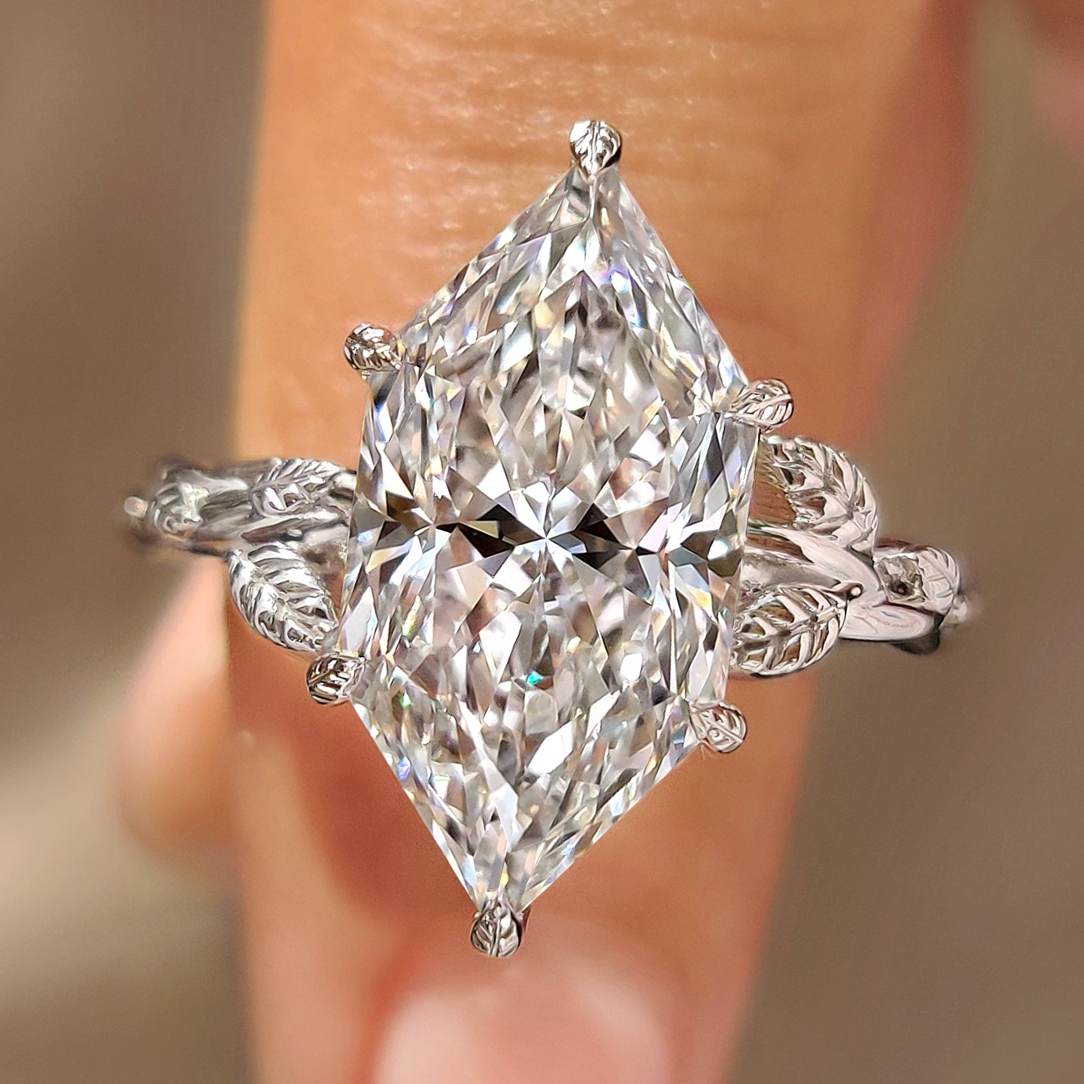 Solitaire Dutch marquise ring with basket setting
