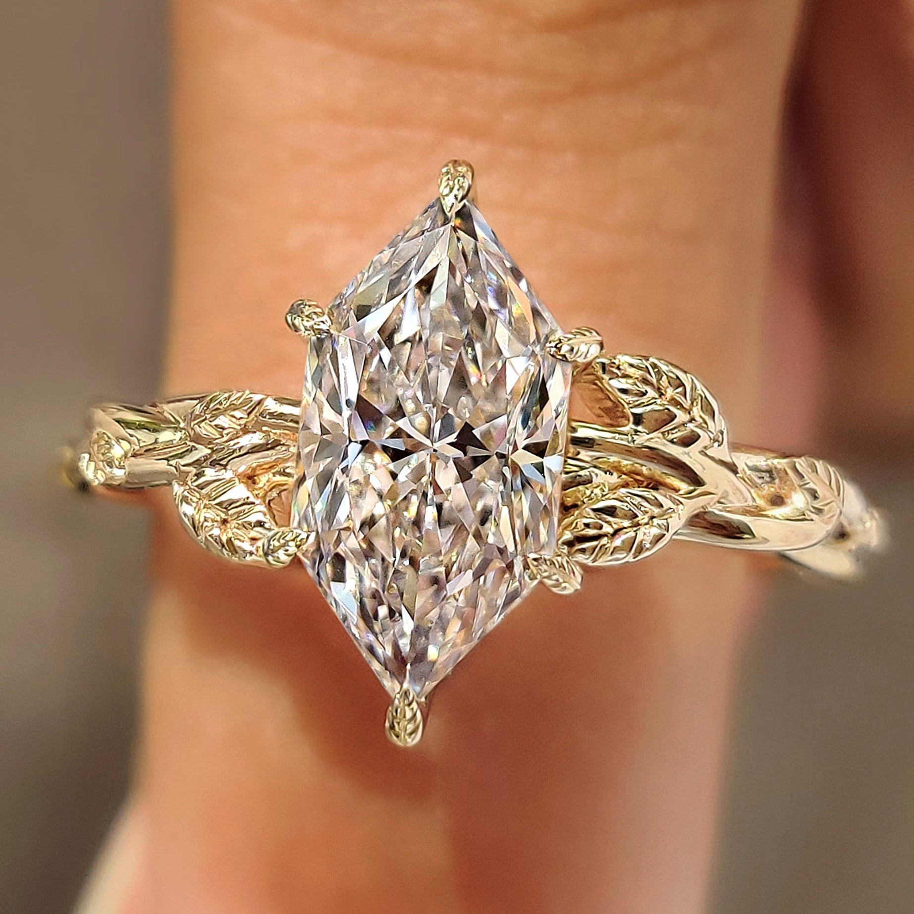 Dutch marquise engagement ring with leaf and vine shank
