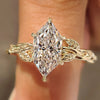 Dutch marquise engagement ring with leaf and vine shank
