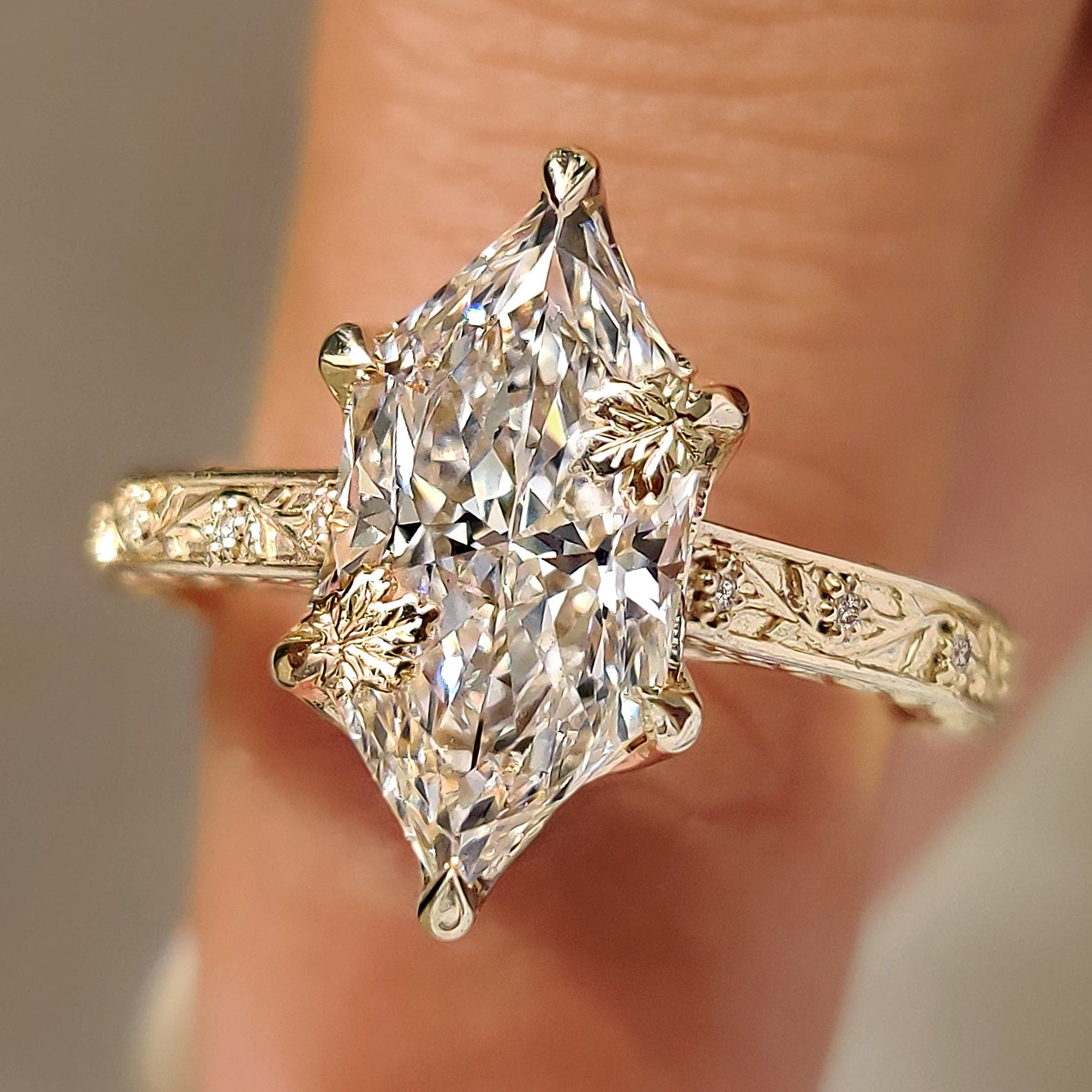 Dutch marquise diamond ring with floral and vine detailing
