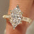 Dutch marquise diamond ring with floral and vine detailing
