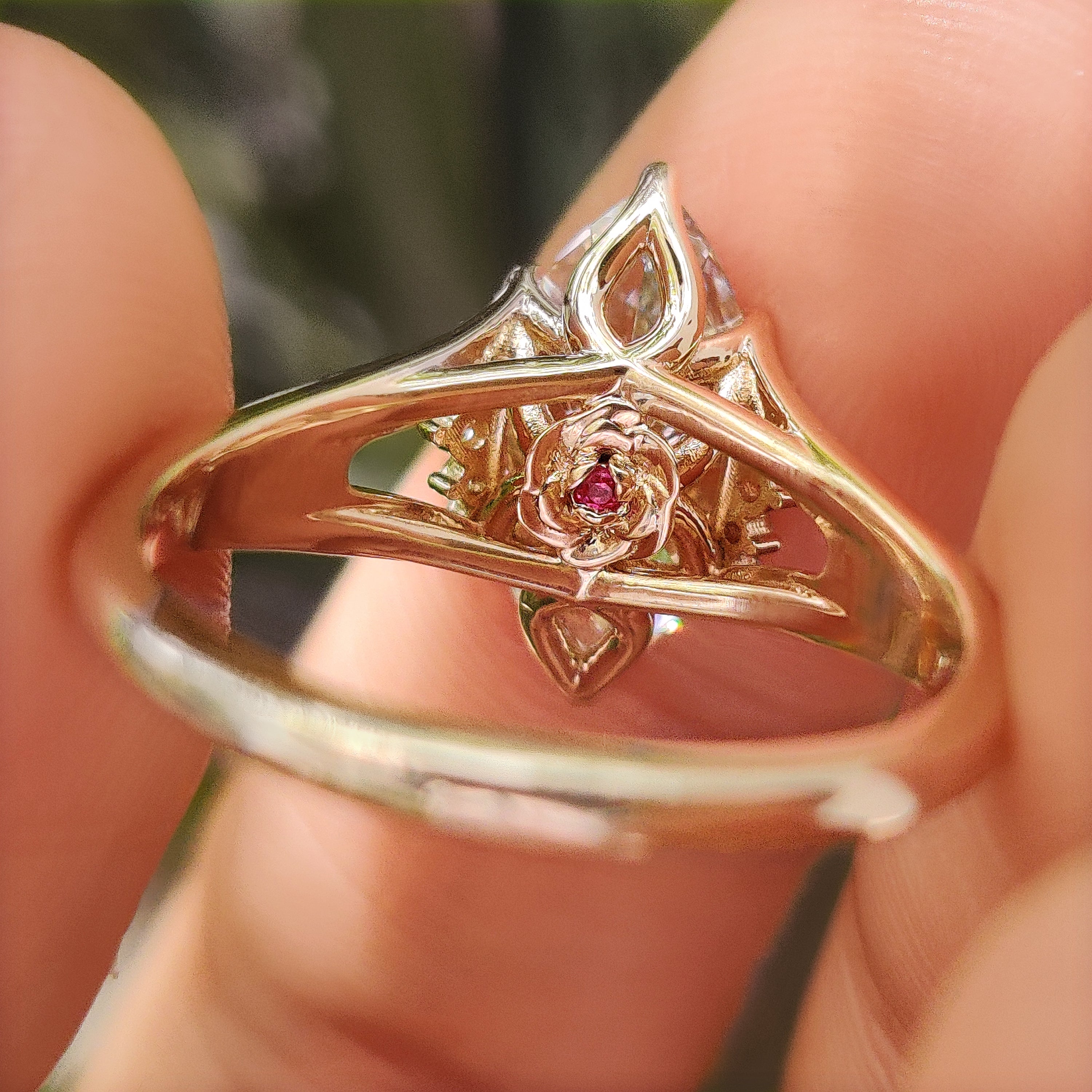 Handmade marquise ring with hidden flower ruby and diamonds
