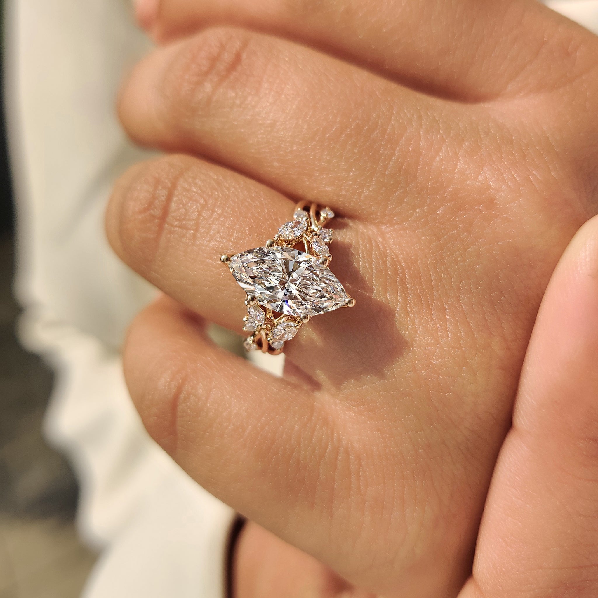 Handmade marquise diamond ring with twisted shank design.
