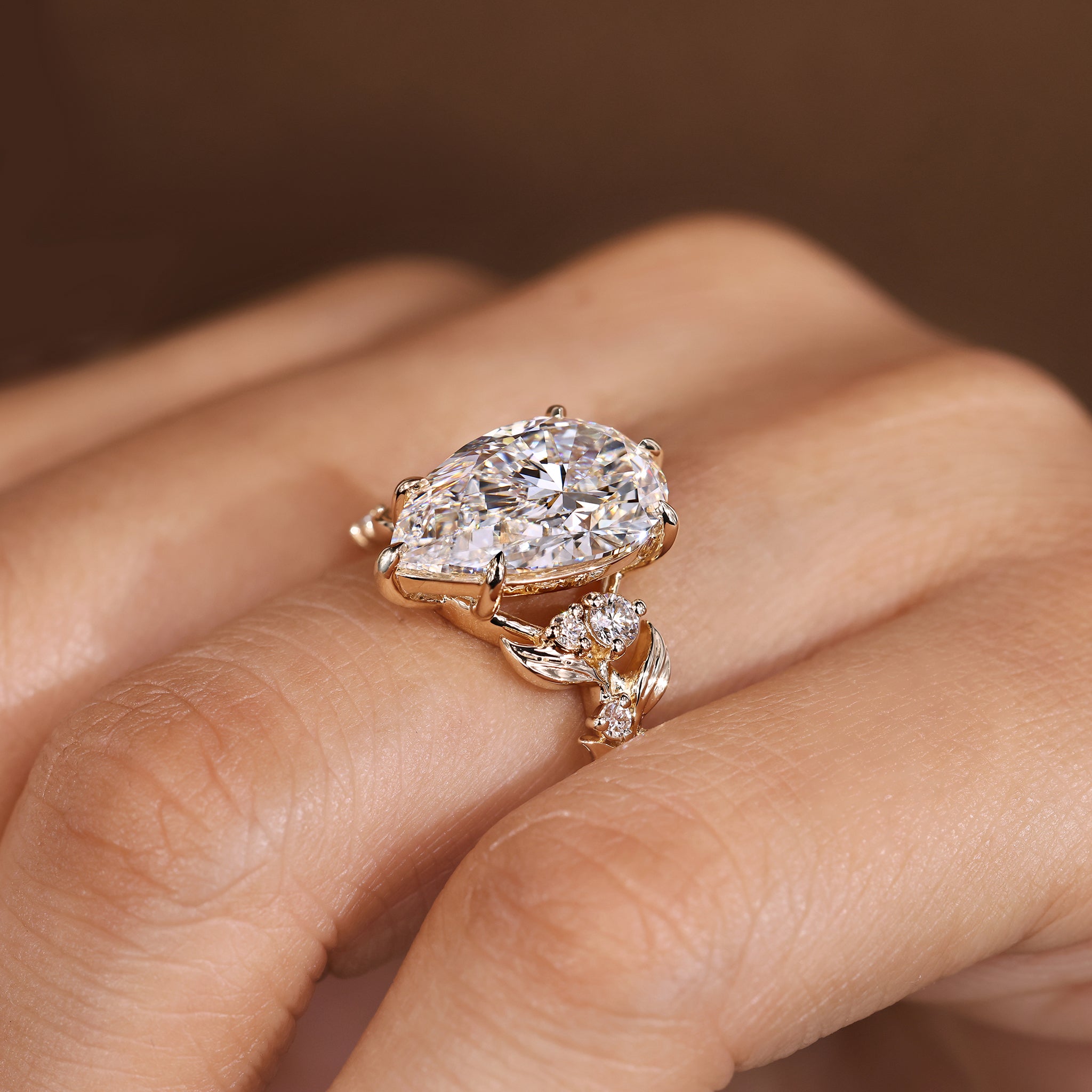 Lab grown pear shaped diamond ring available in 5 carat size
