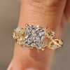 Princess cut ring with nature inspired leaf design.
