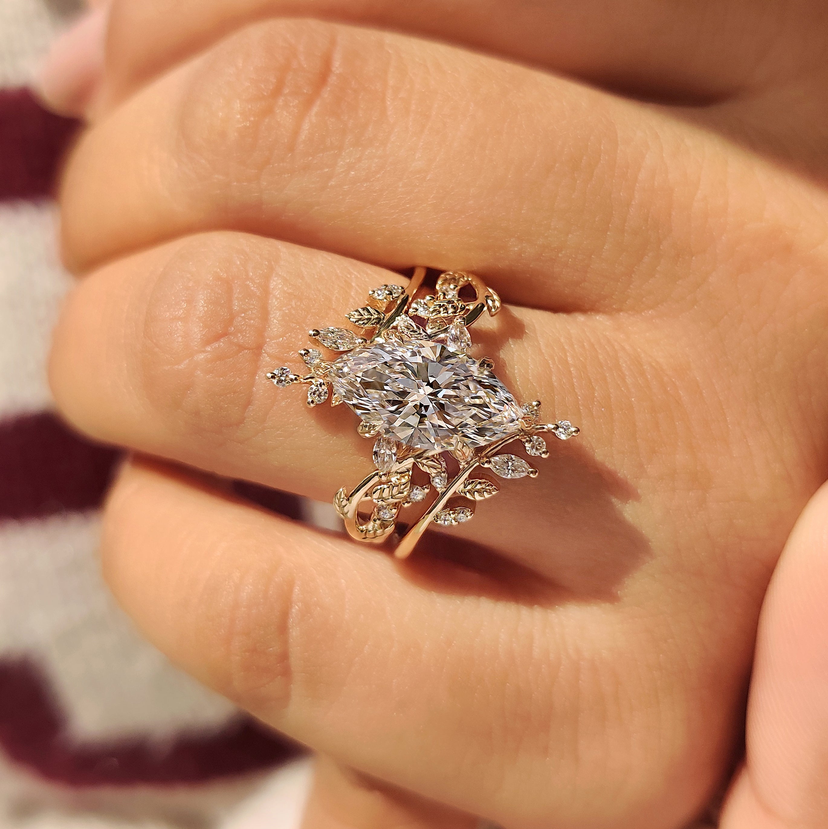 Marquise diamond bridal set with nature inspired leaf details

