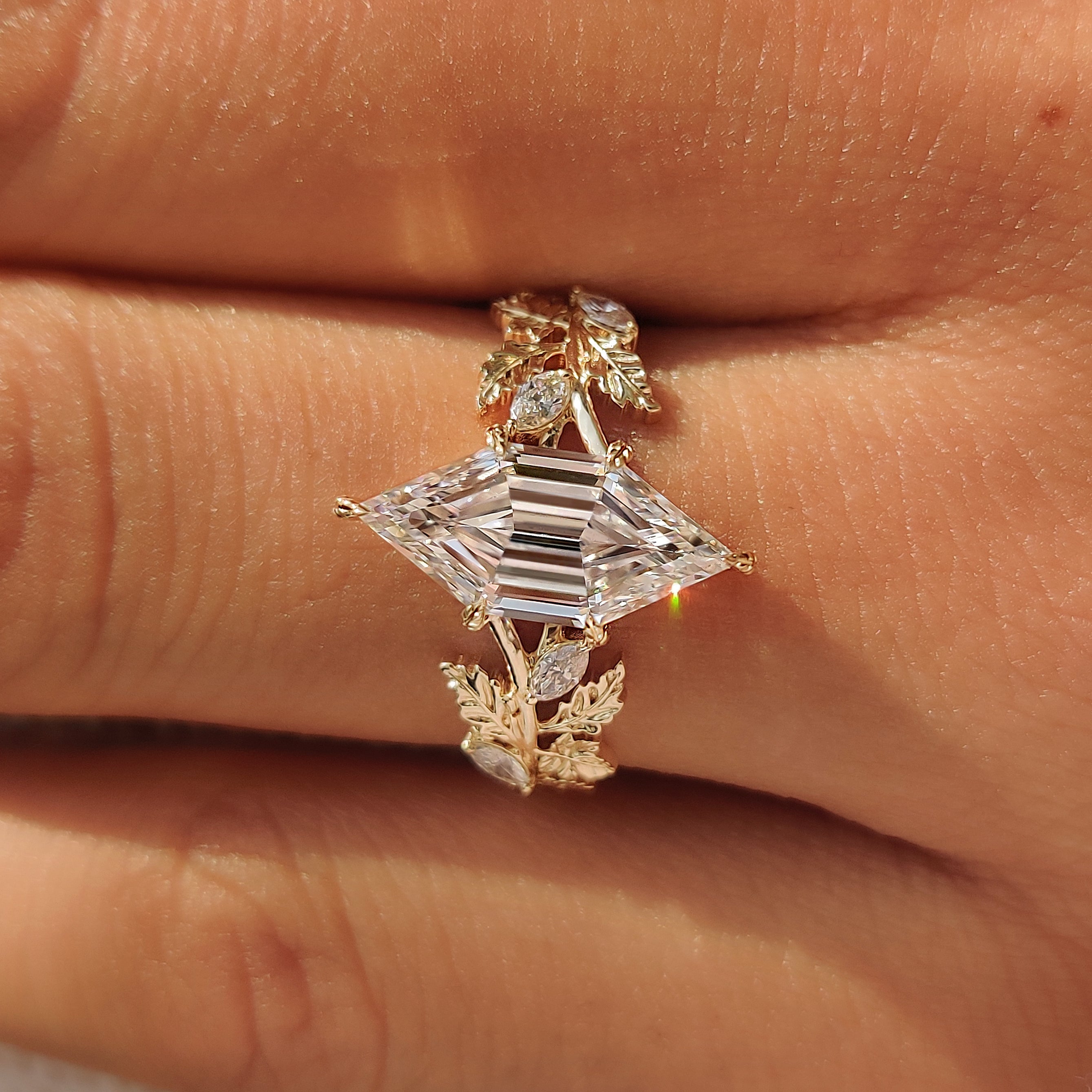 Lab grown hexagon step cut diamond engagement ring.
