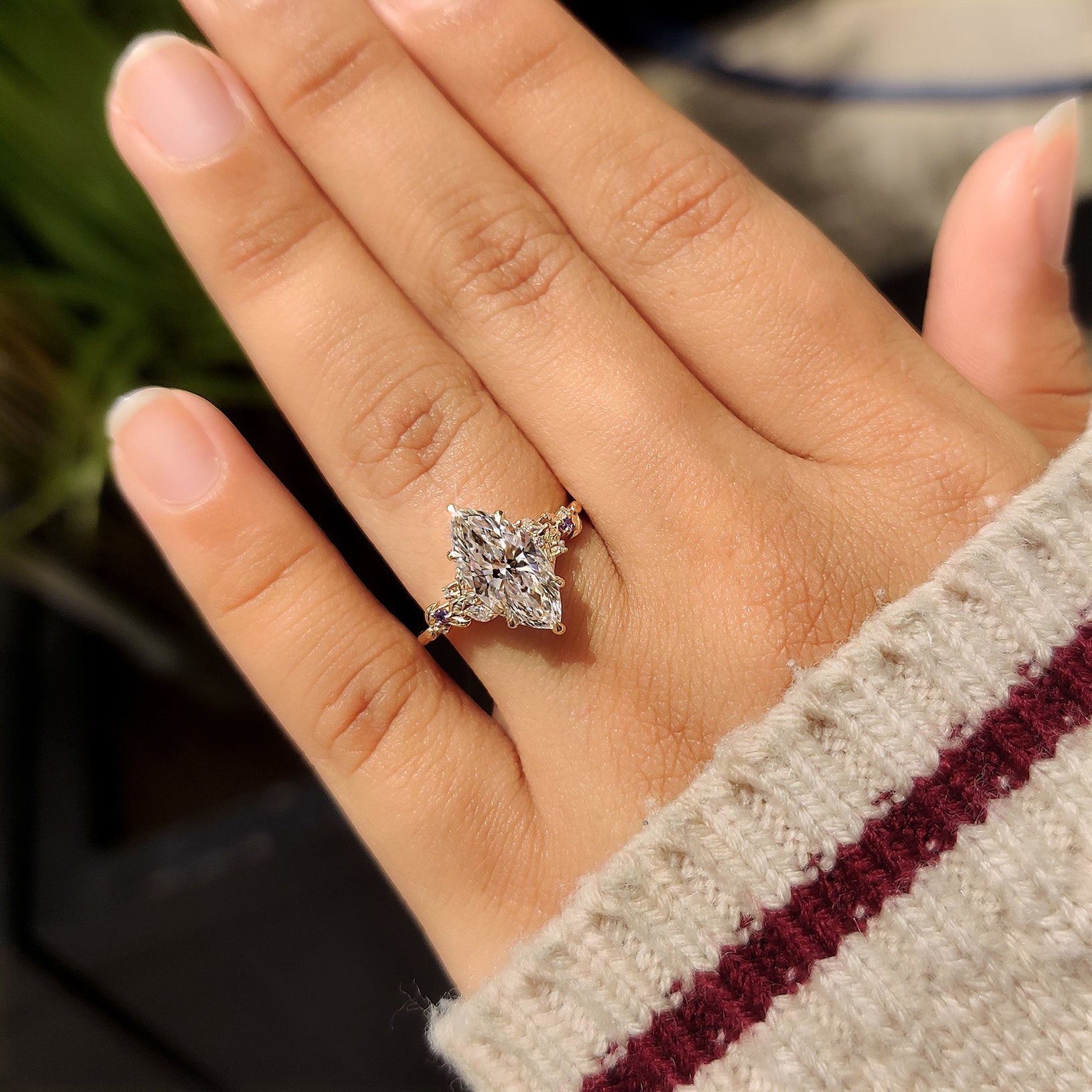 Marquise ring with marquise amethyst side stones
