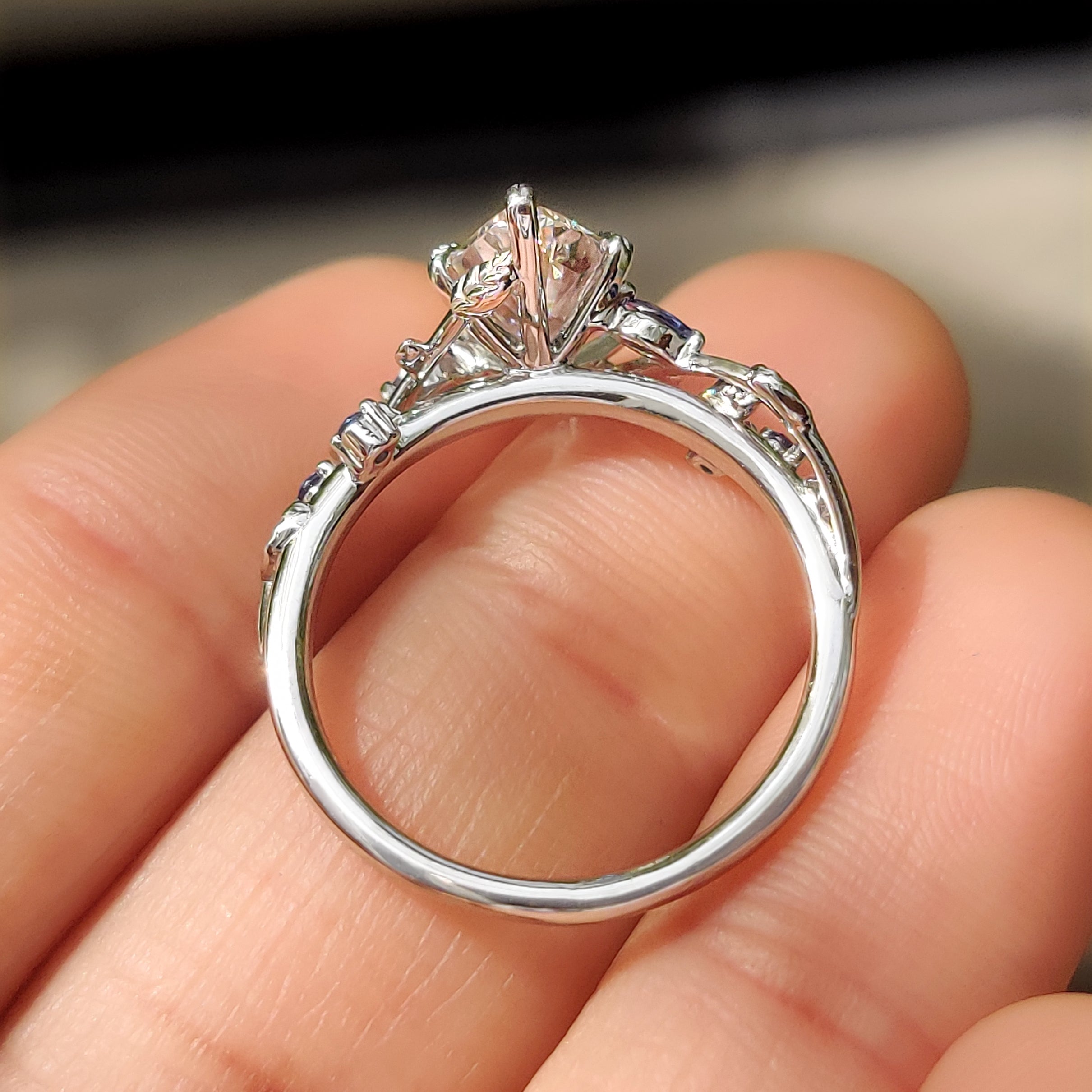 Dutch marquise ring with cluster setting and leaf style prong setting
