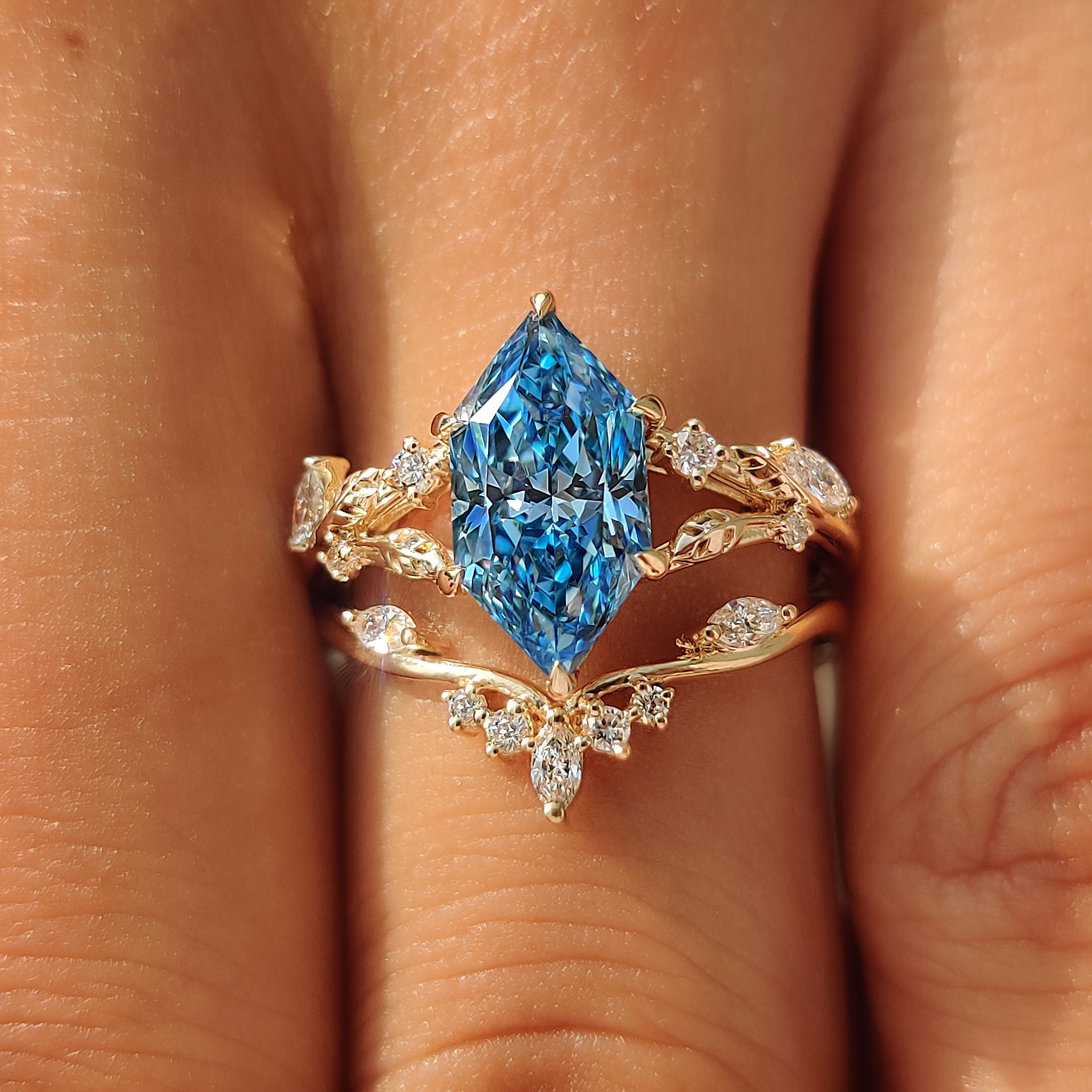 Leaf and vine details on a Dutch marquise engagement ring.
