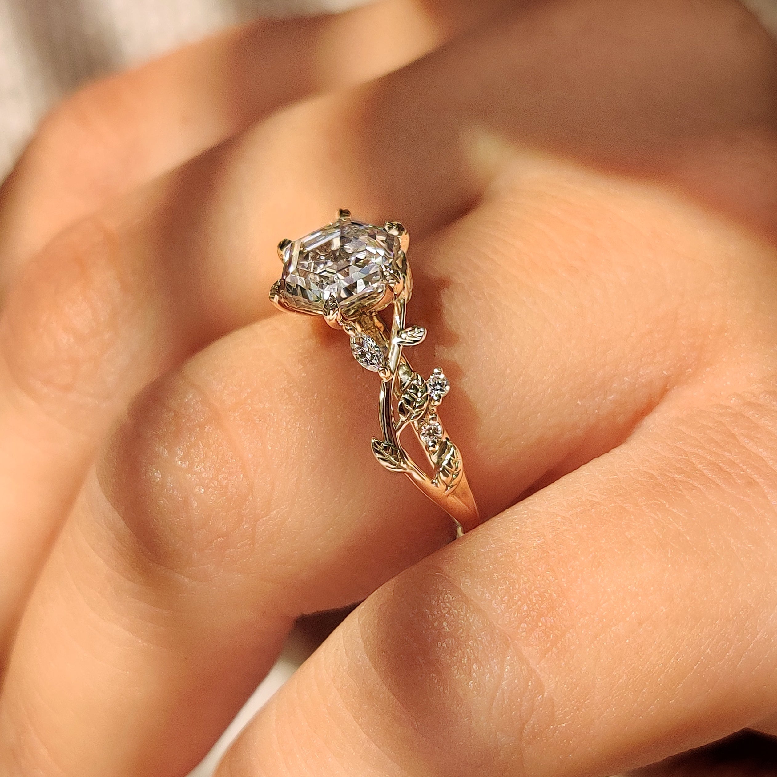 Handmade hexagon engagement ring with round and marquise diamonds
