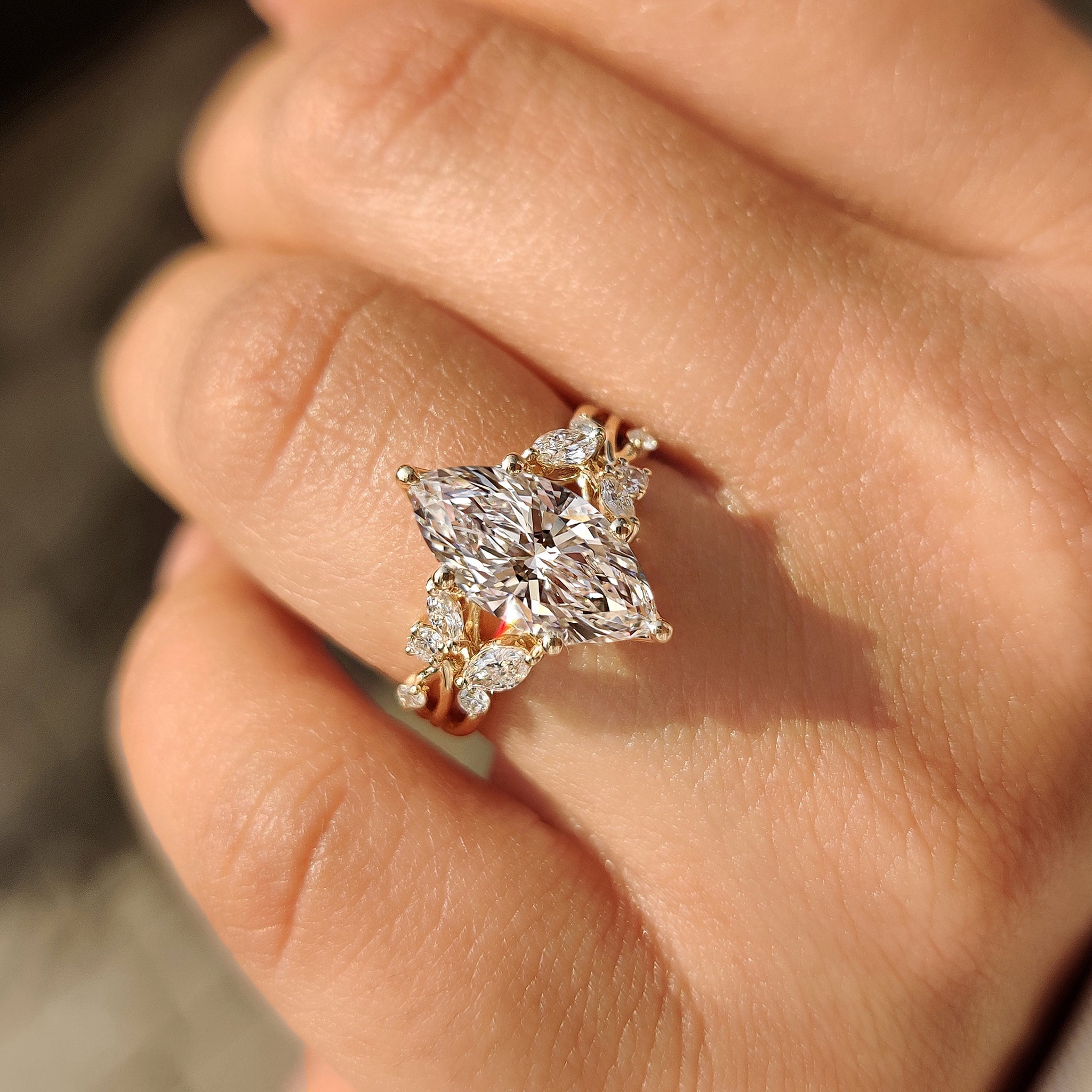 Nature style marquise diamond ring with six prong setting.
