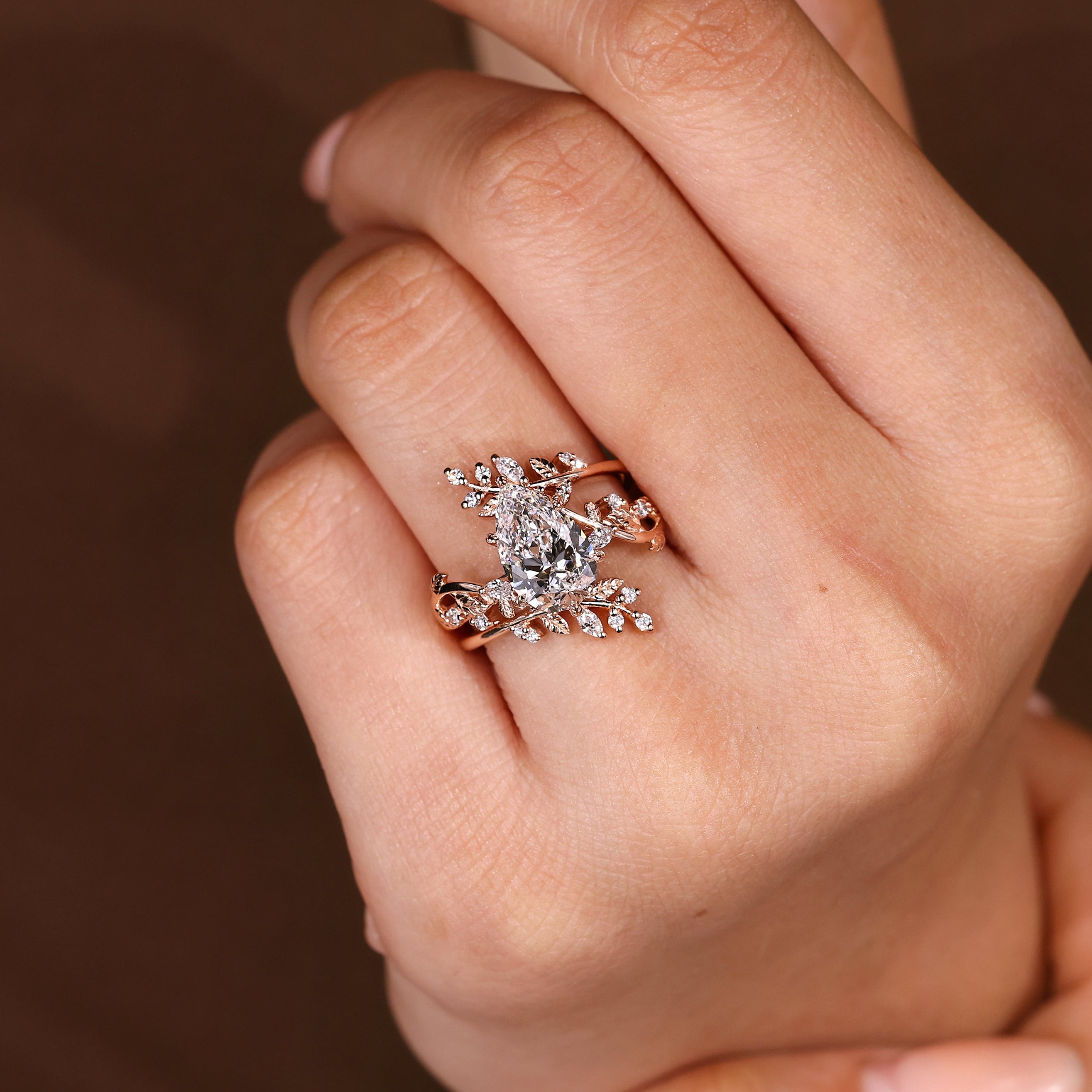 Lab grown pear diamond ring with wrap guard band
