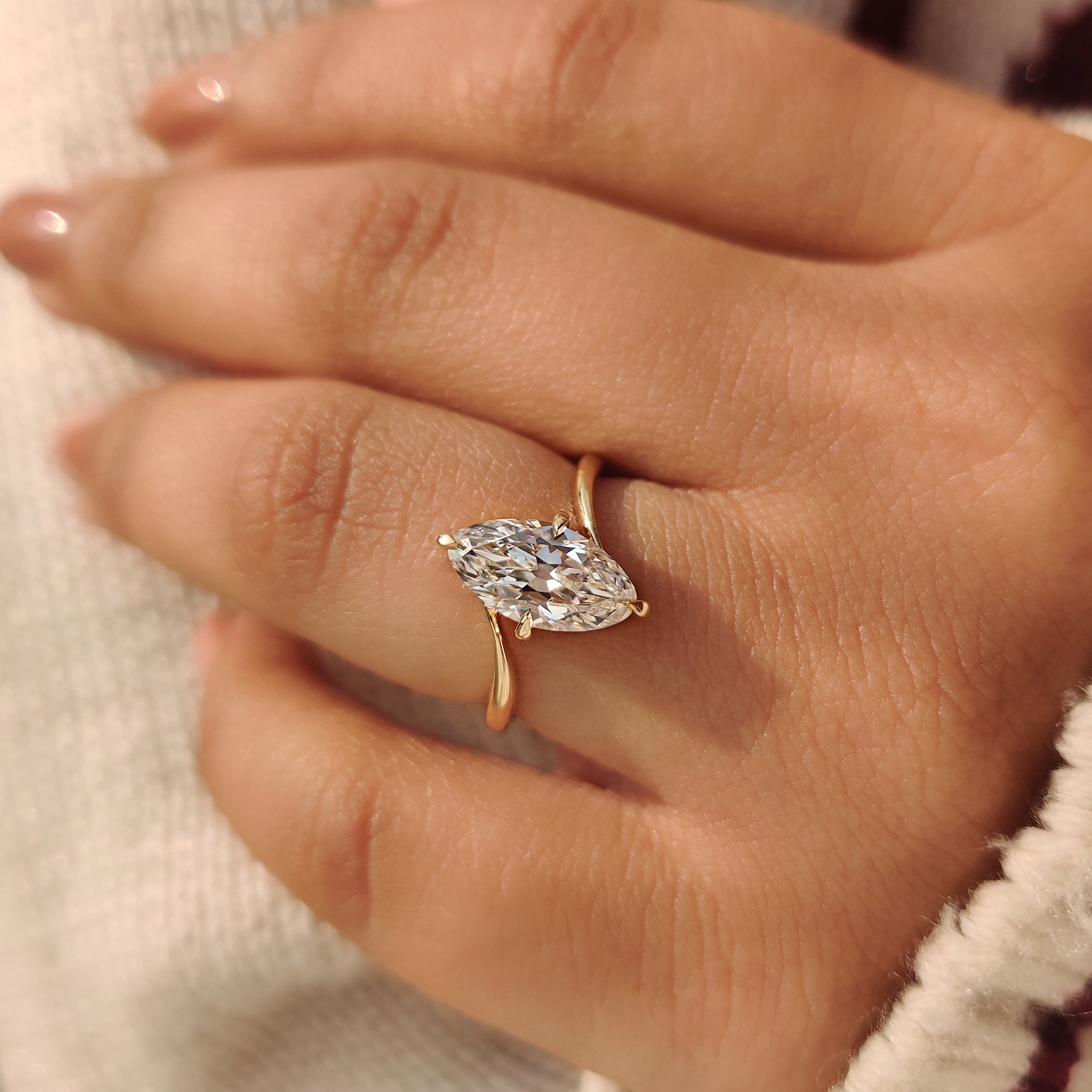 Lab grown marquise diamond ring in solitaire bypass setting
