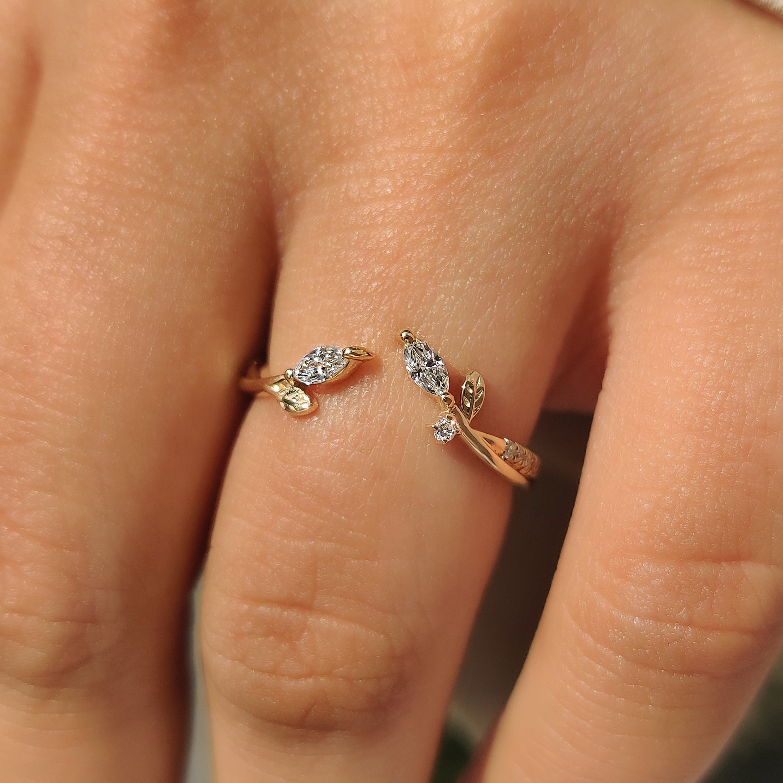 Open gap wedding band with round and marquise diamonds.
