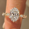 Oval center diamond with marquise and round side stones
