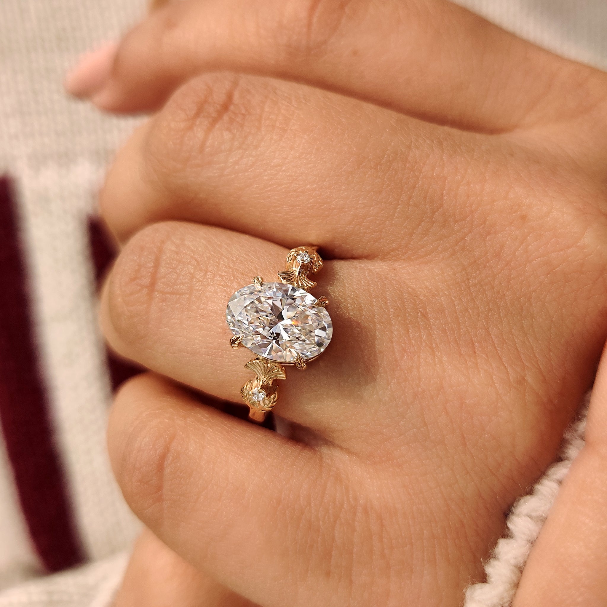 Elegant oval diamond ring with lab grown diamond center
