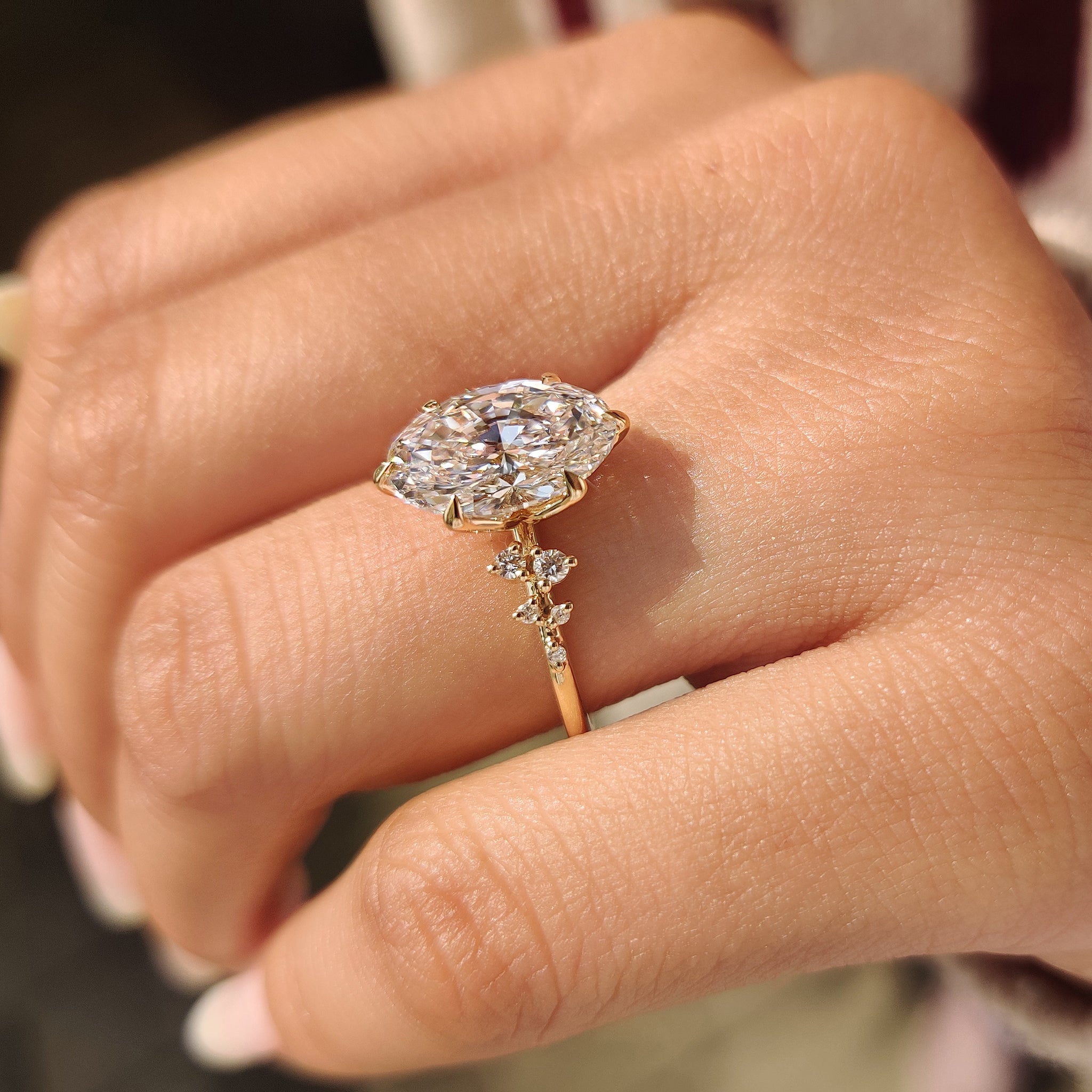 Handmade oval diamond ring with six claw prong setting.
