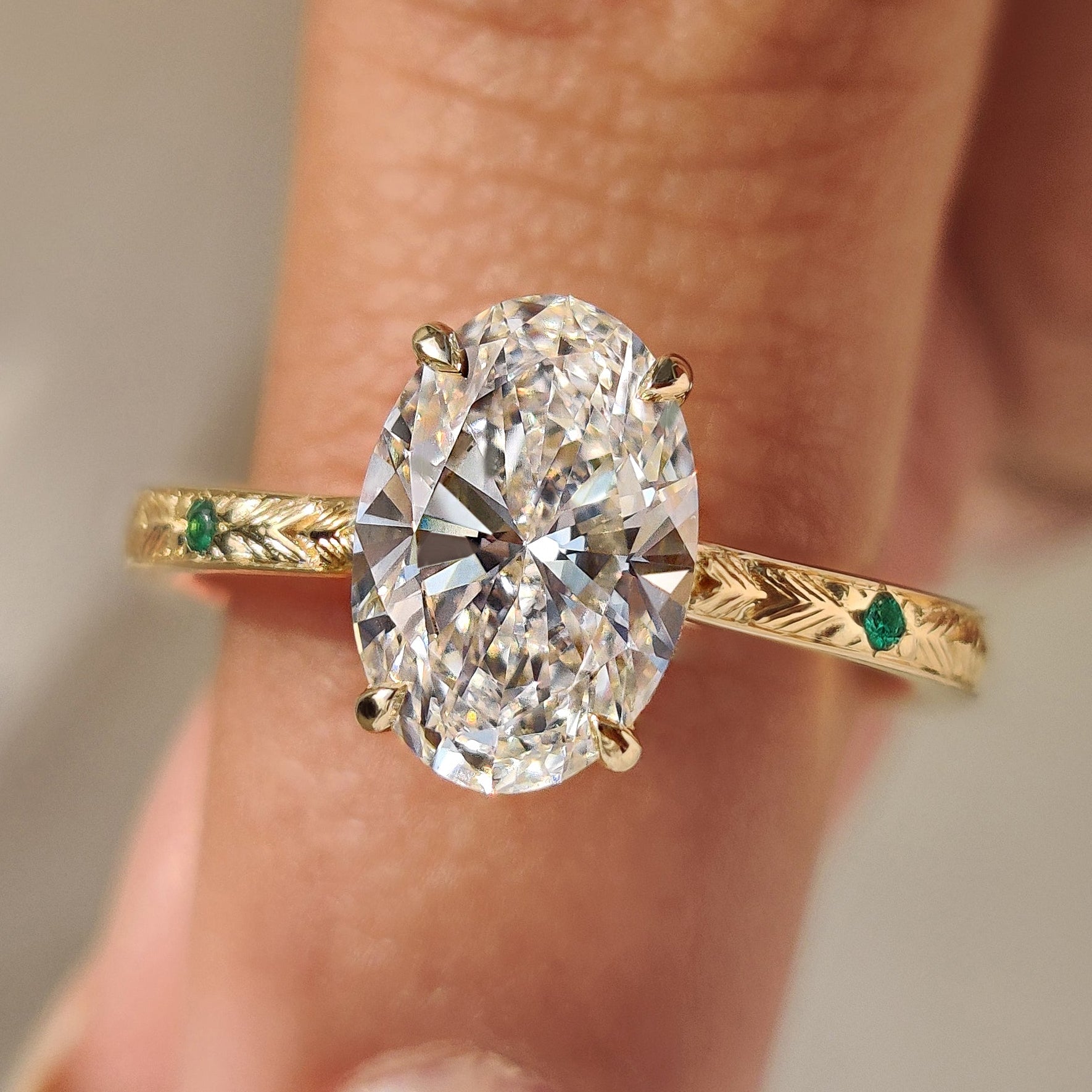 Art Deco diamond ring with oval cut center diamond.
