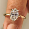 Oval engagement ring with solitaire lab grown diamond and eight claw prong
