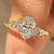 Oval cut lab grown diamond ring with round side stones
