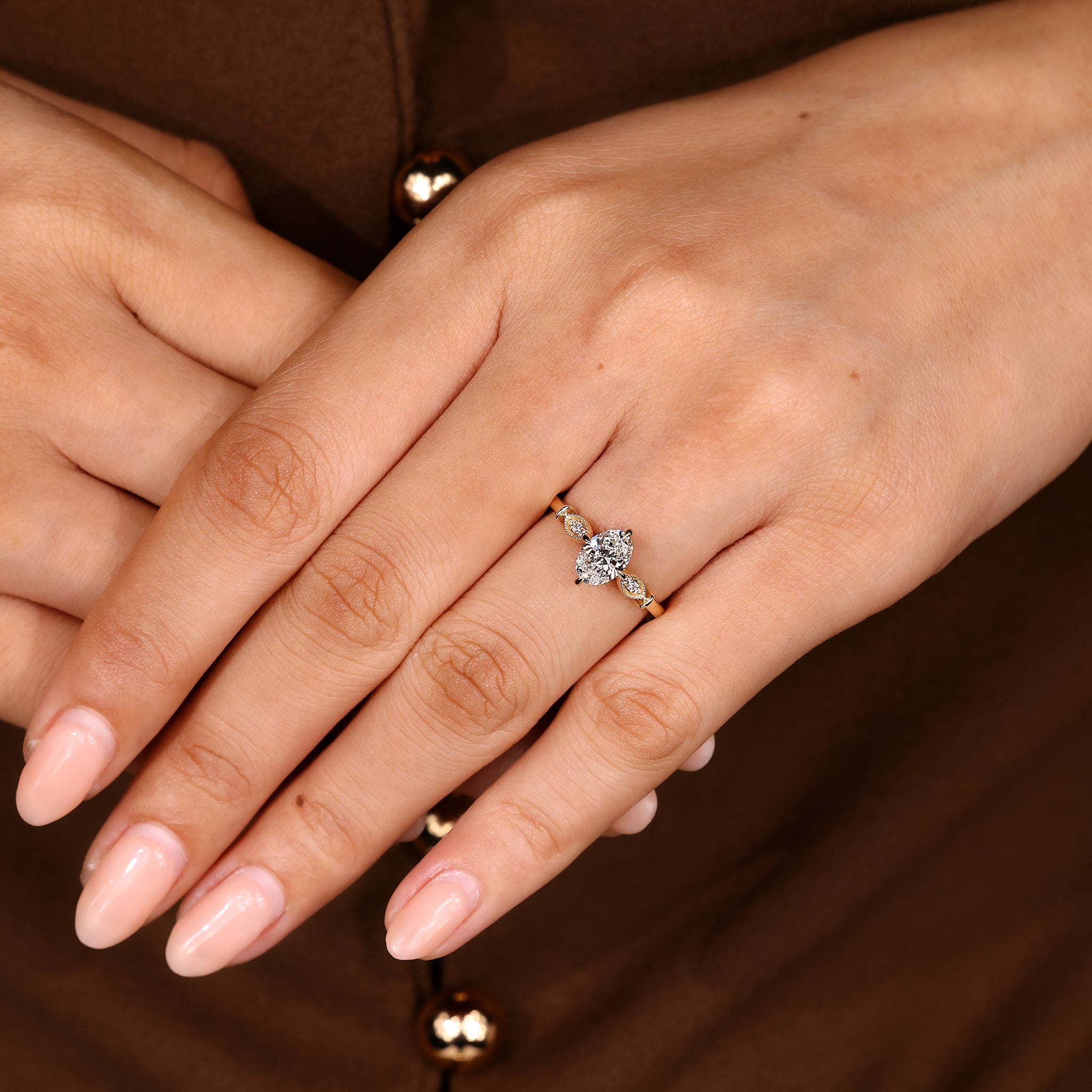 Vintage style oval diamond ring with claw prong setting