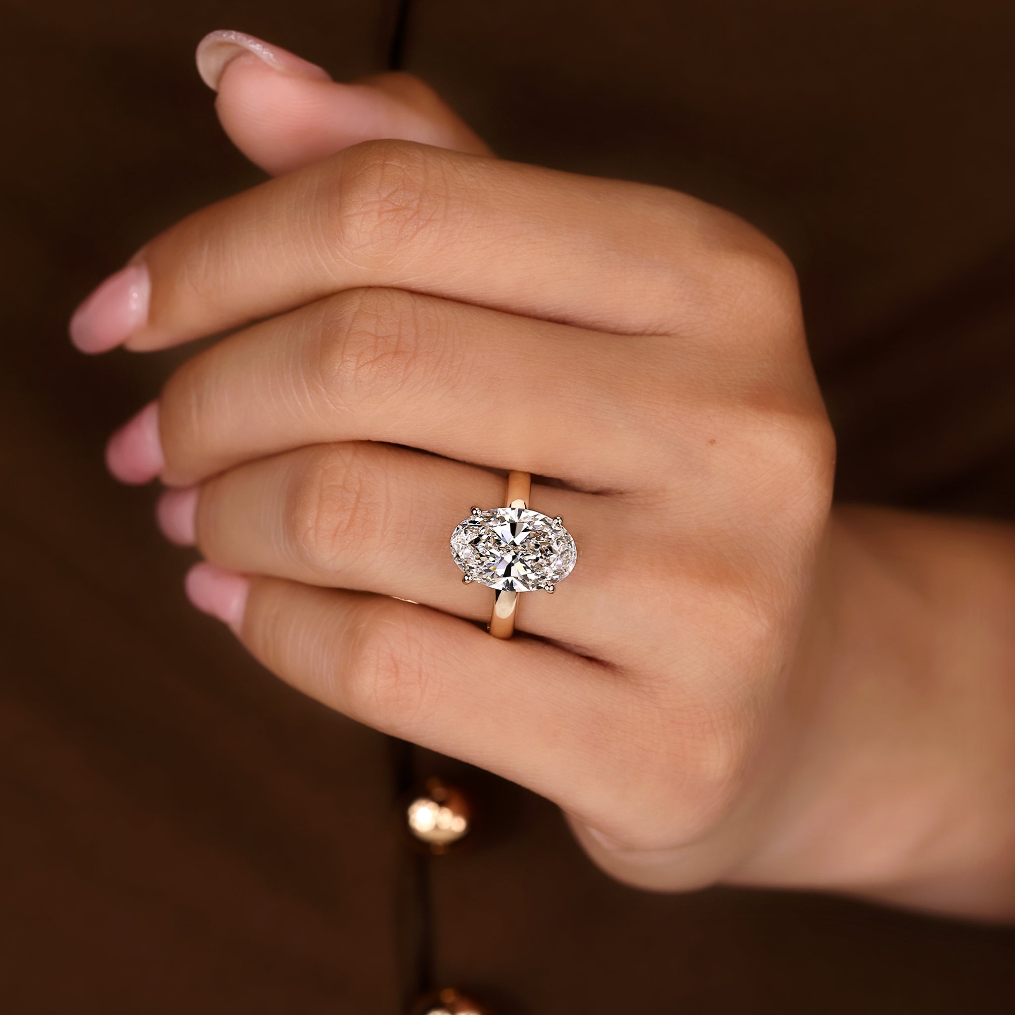 Hidden halo engagement ring with secure four prongs
