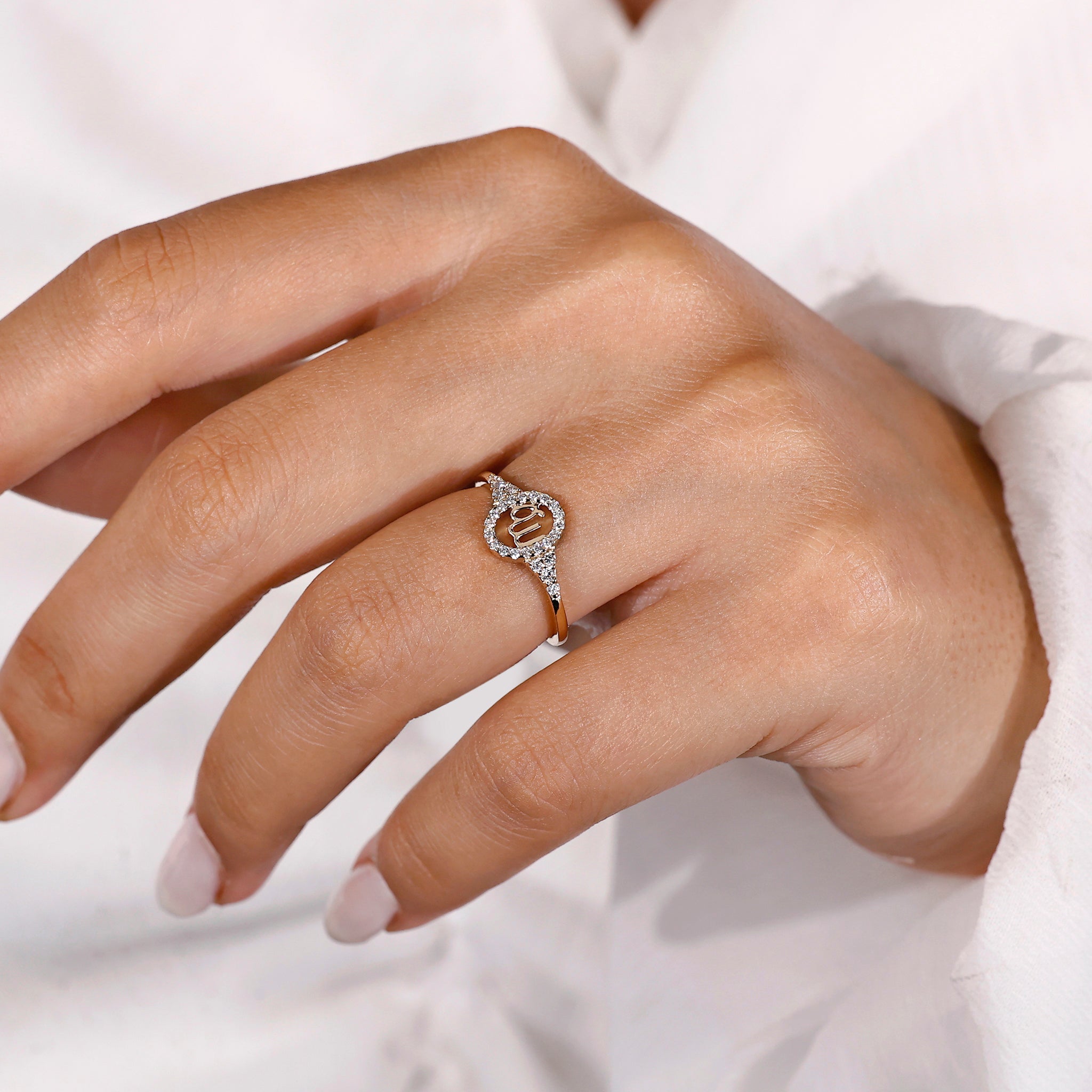 Zodiac sign ring with Virgo horoscope and round side stones.
