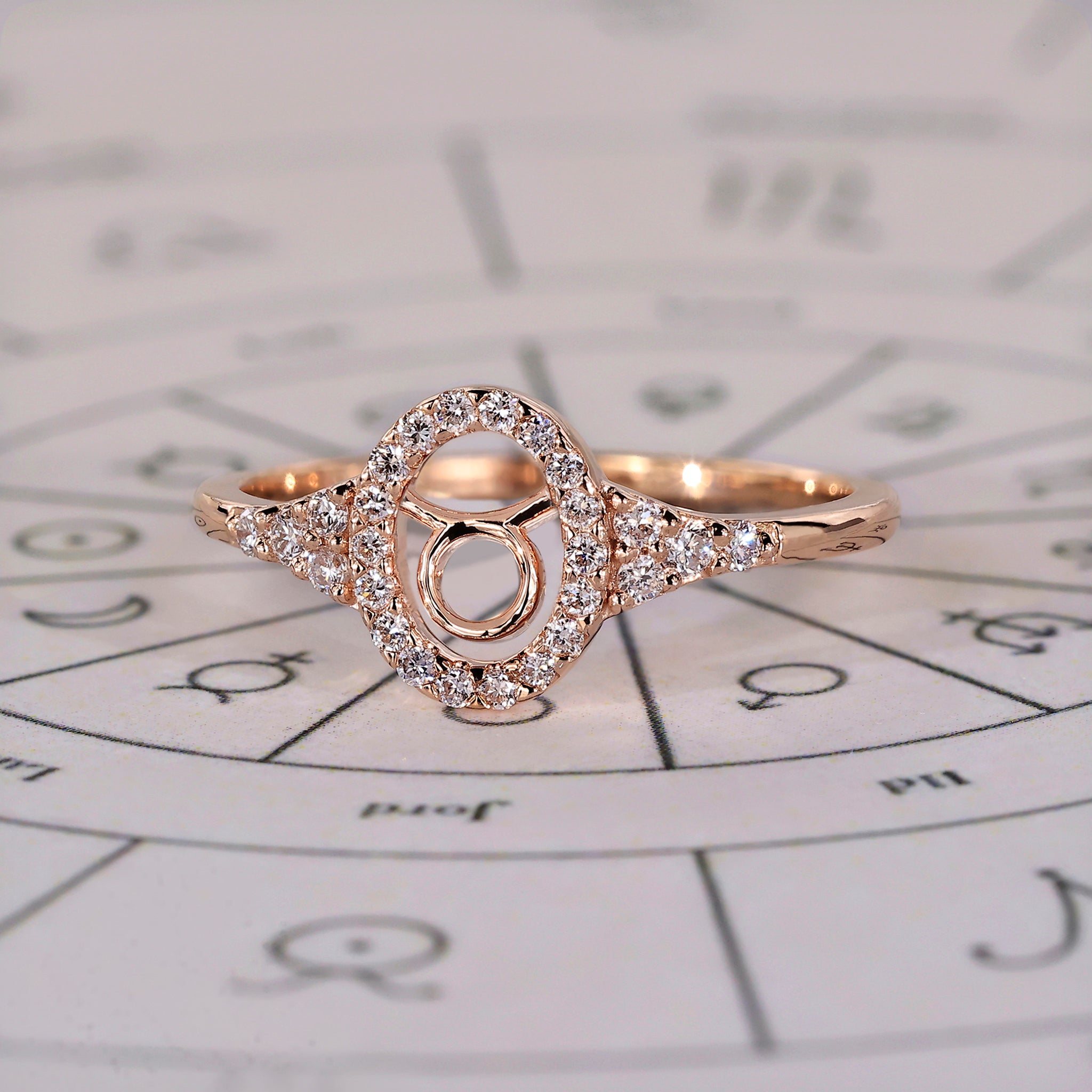 Buy engagement ring with Taurus zodiac design and halo diamond setting.