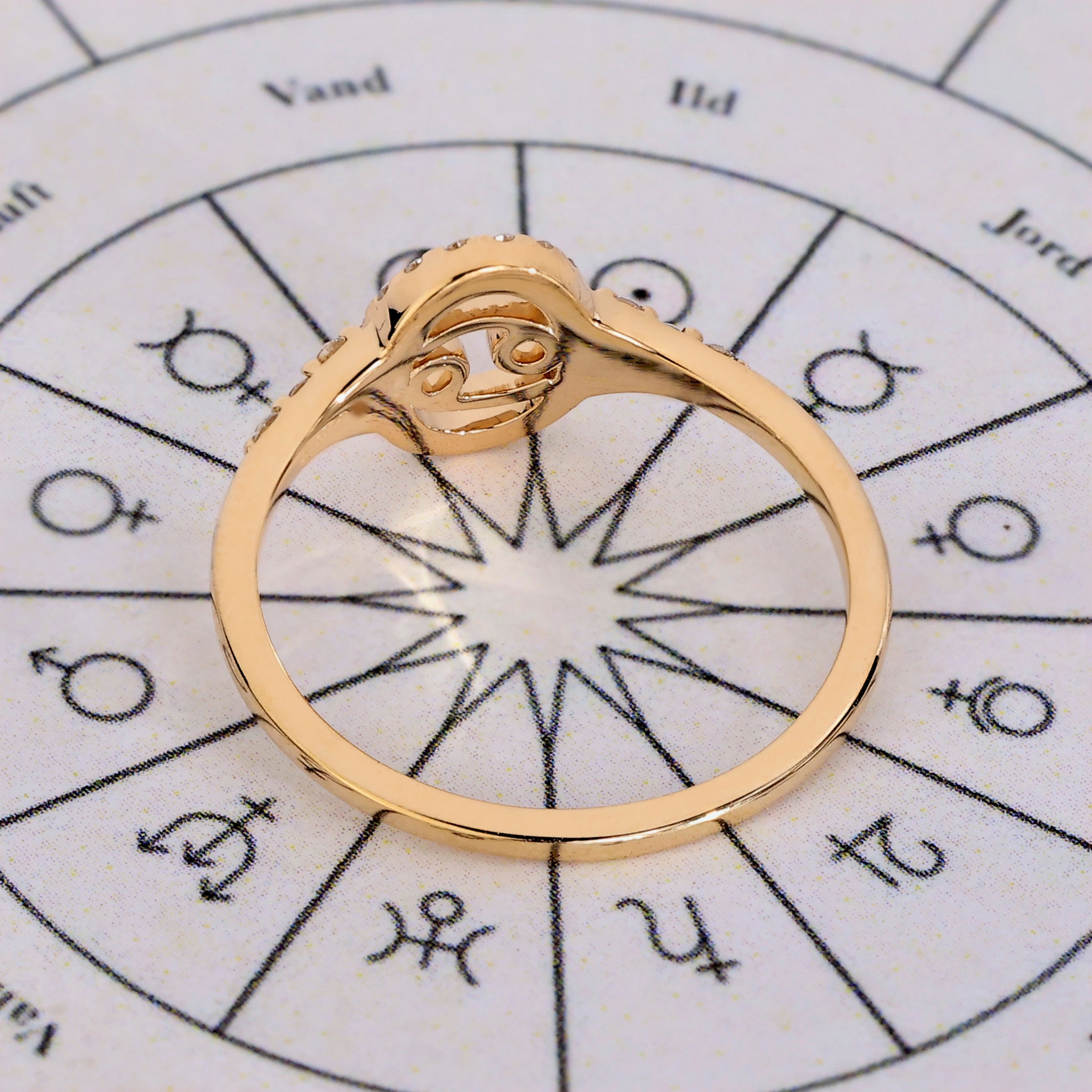 Buy engagement ring with Cancer zodiac design and halo diamond setting.
