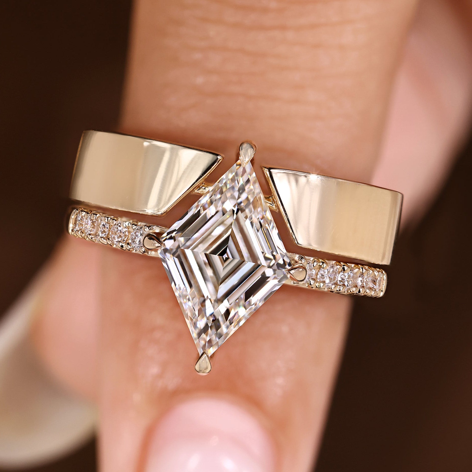 Pave engagement ring with wedding band lozenge cut diamond.
