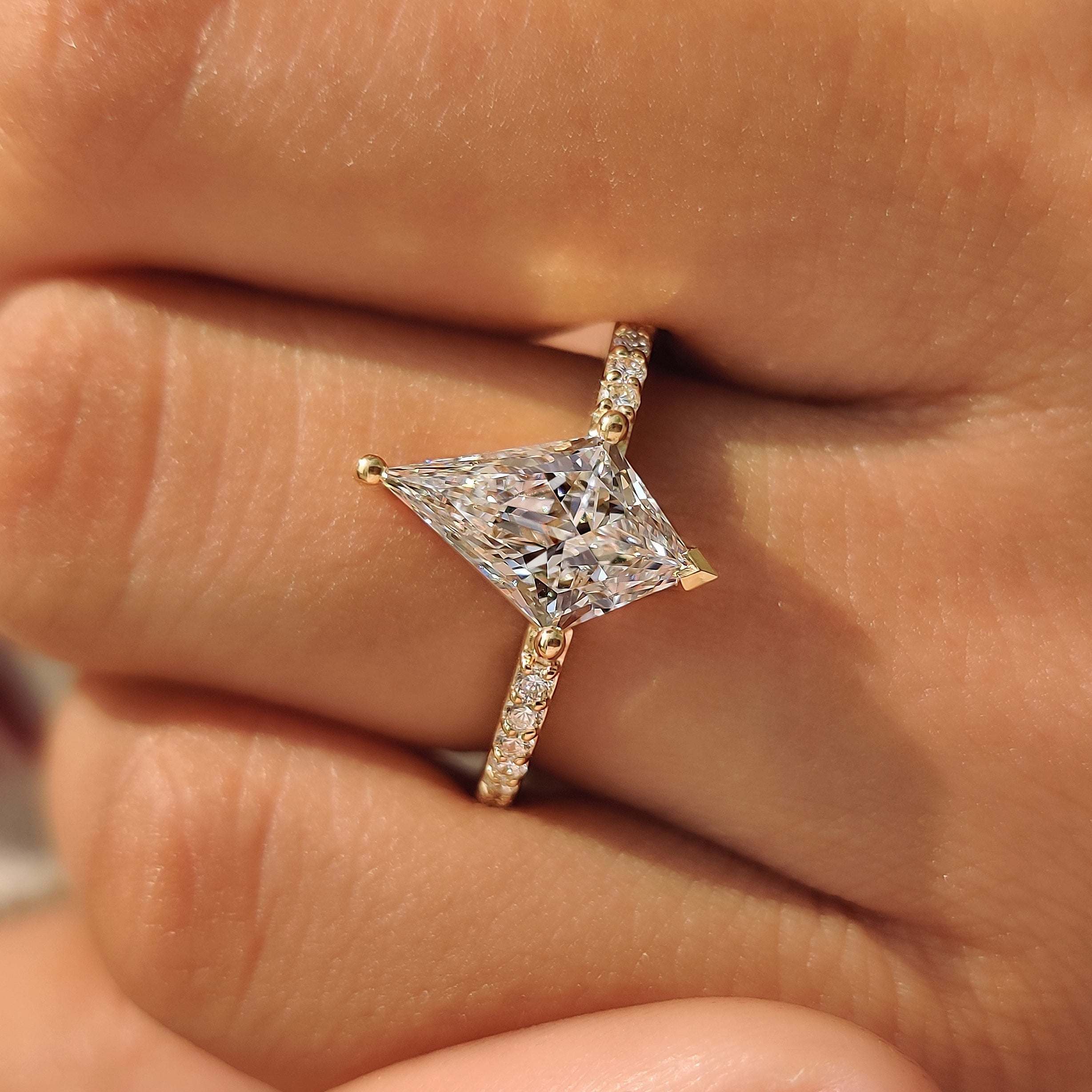 Handmade kite cut engagement ring by Carat Diamonds.
